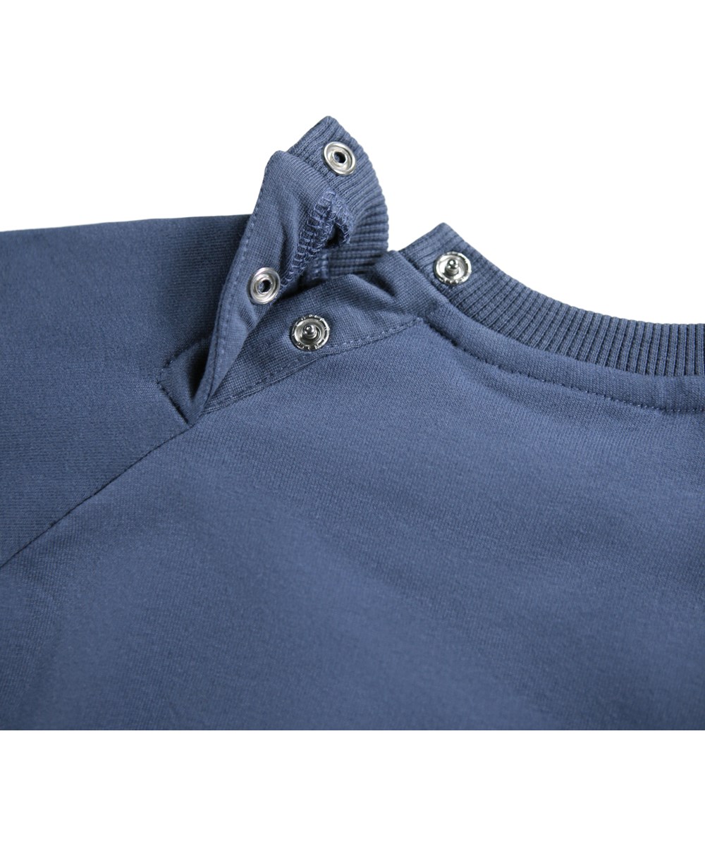 Disc - Evening Sky - Dark blue sweatshirt for the little ones made of soft organic cotton with an embroidered smiling face on the front.