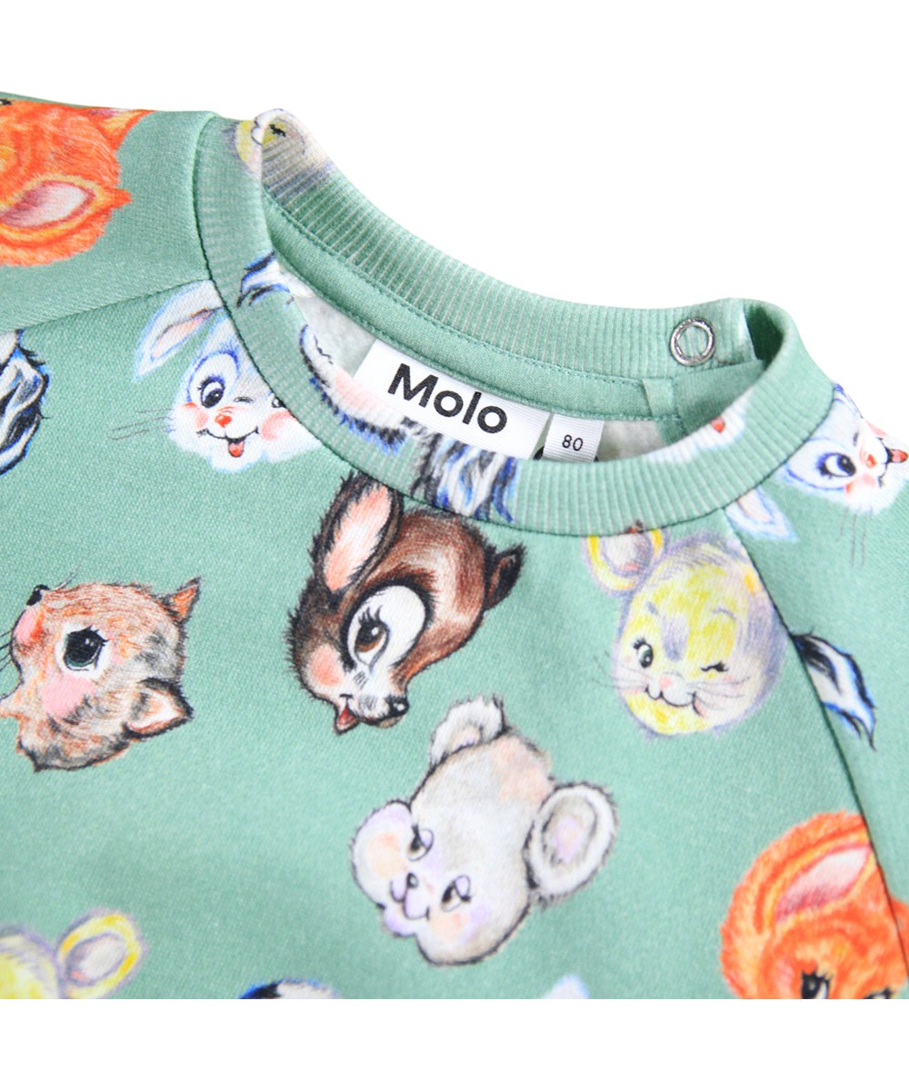 Disc - Itty Bitty - Green sweatshirt for the little ones made of soft organic cotton with a colorful print of old cartoon characters.