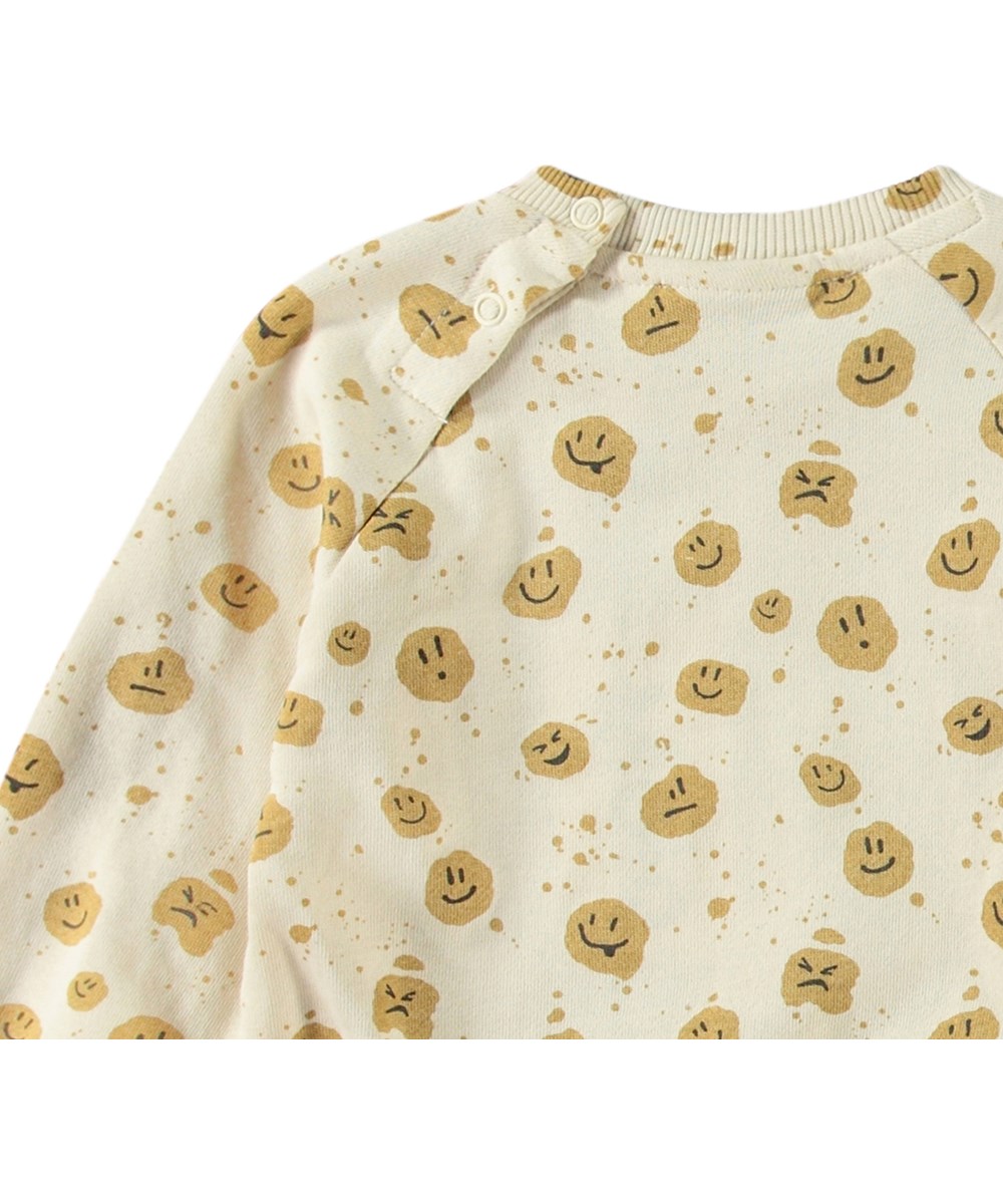Disc - Mood Dots - Organic beige baby sweatshirt with face print.
