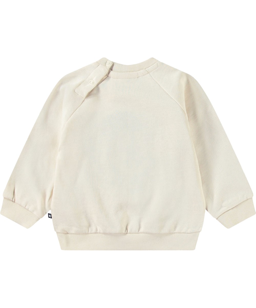 Disc - Summer Sand - Organic beige baby sweatshirt with a soft smiling face in blue.