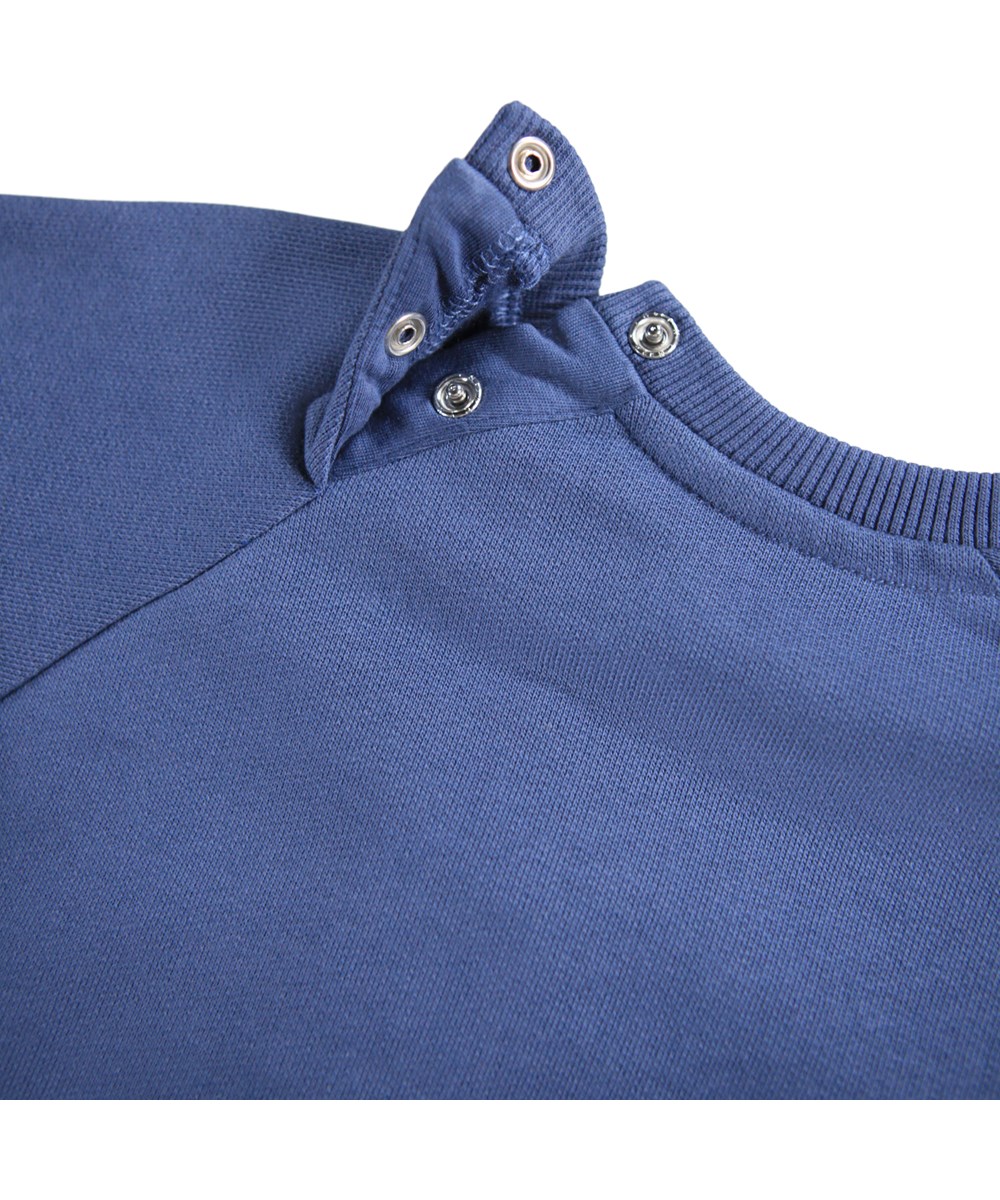 Disc - Toy Elephant - Blue sweatshirt for the little ones made of soft organic cotton with an embroidered elephant face on the front.