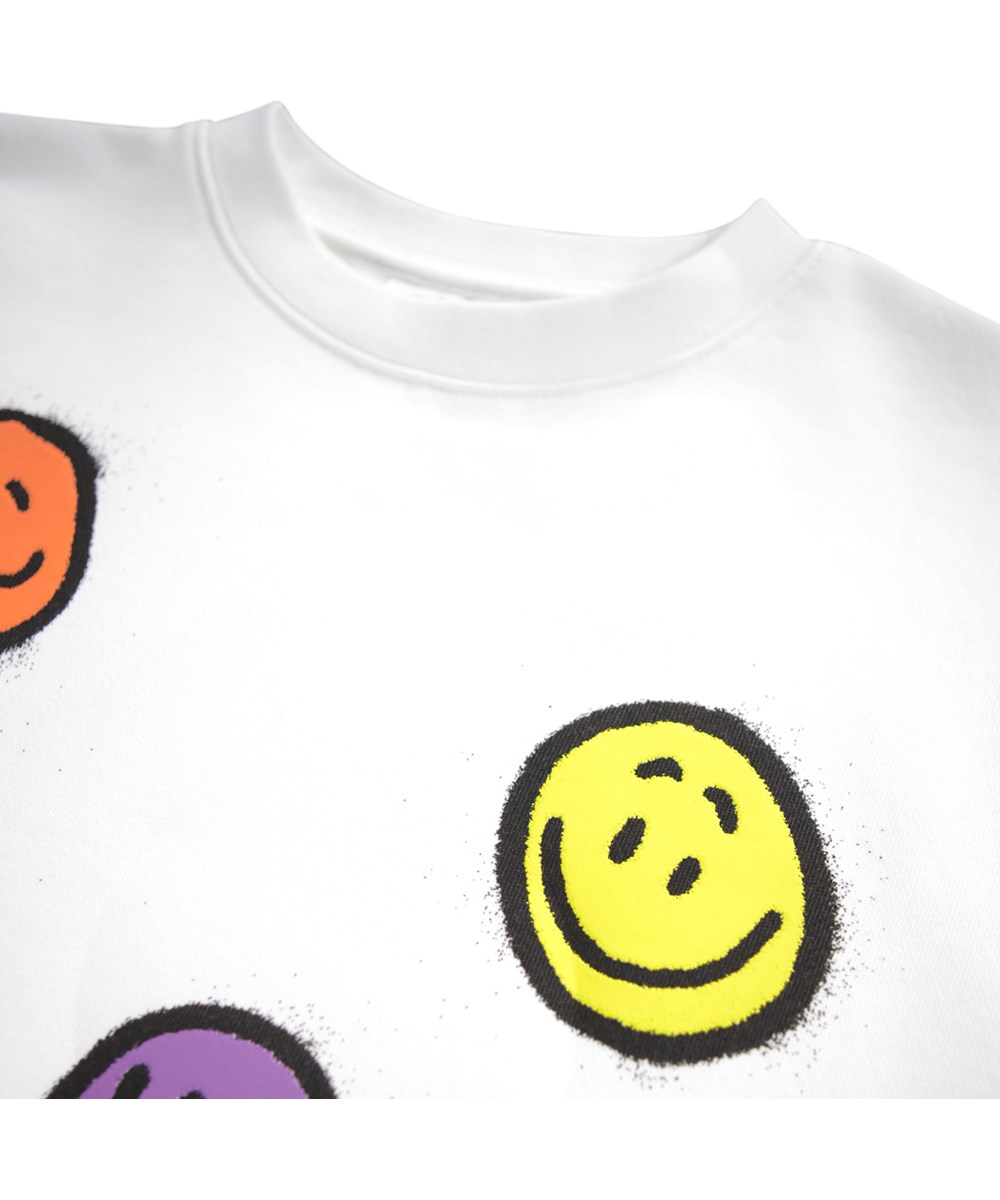 Monti - Crisp White - White sweatshirt for children made of soft organic cotton with colorful faces.