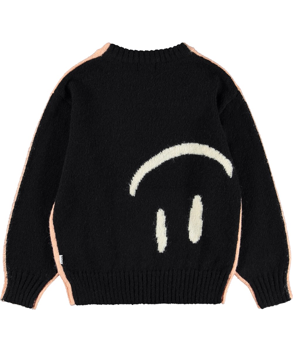Bello - Double Smile - Gestrickter Pullover in Rosa und Schwarz für Kinder aus einer Alpakawollmischung mit lächelnden Gesichtern.