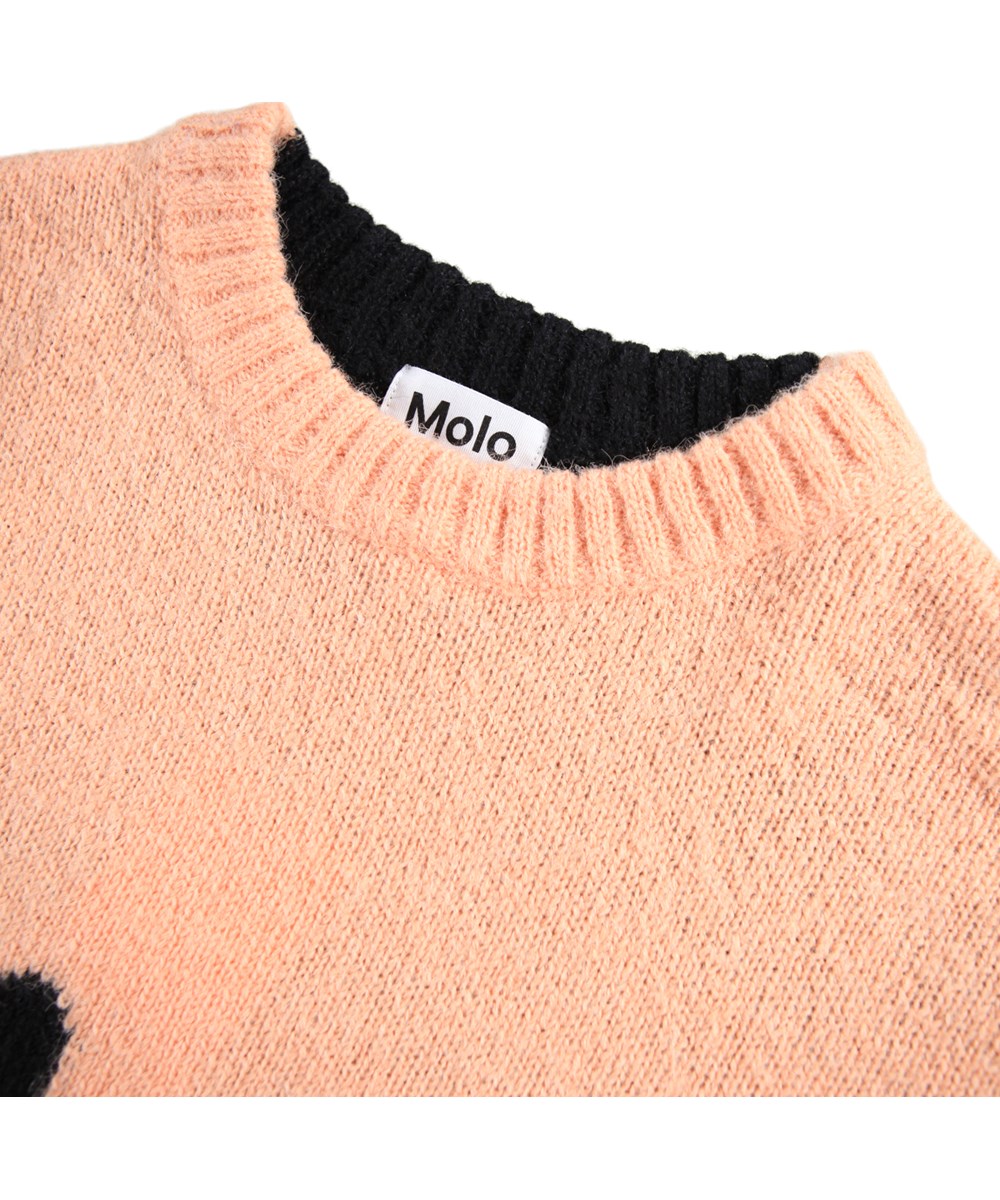 Bello - Double Smile - Gestrickter Pullover in Rosa und Schwarz für Kinder aus einer Alpakawollmischung mit lächelnden Gesichtern.