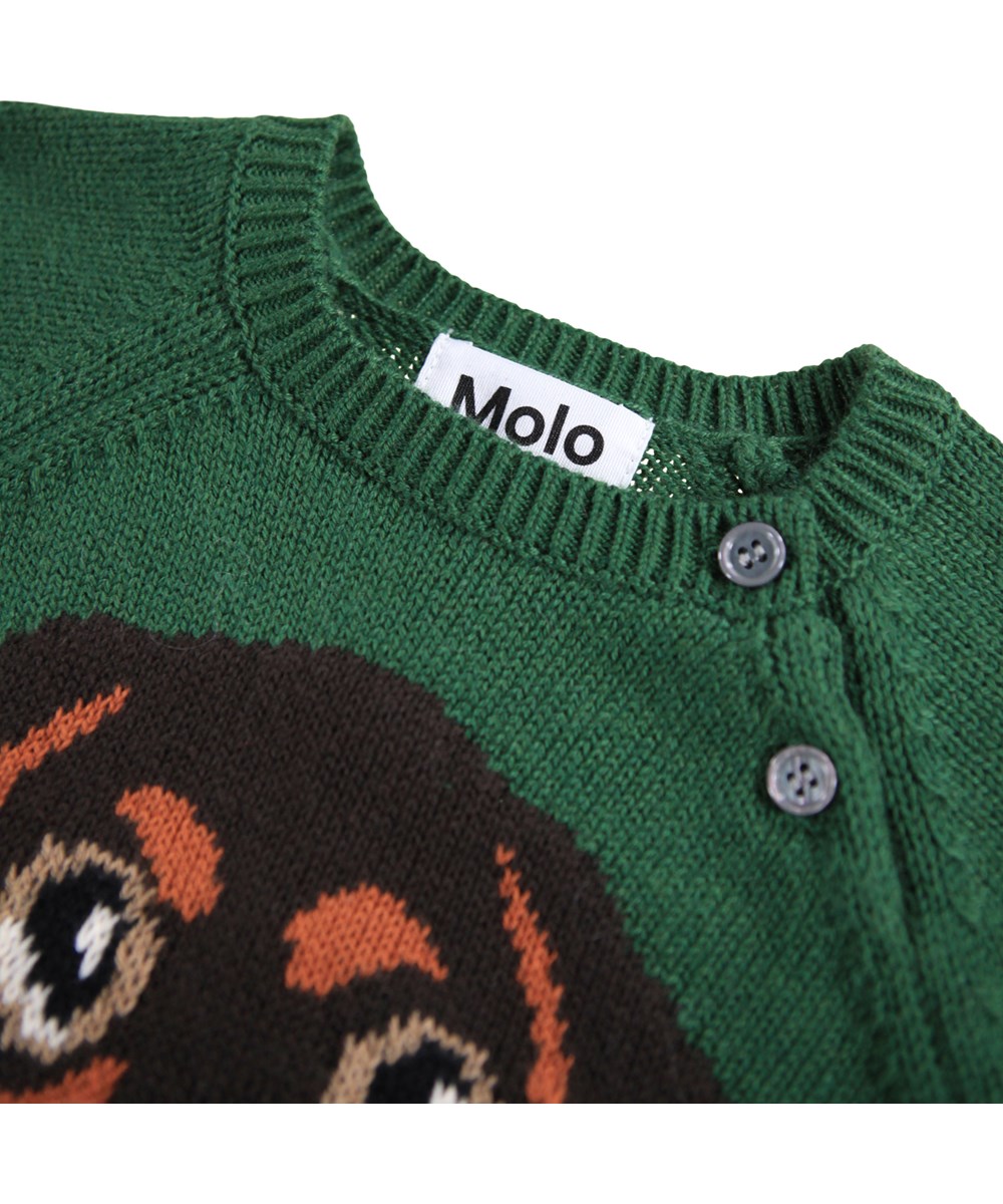 Bless - Dachs Puppy - Dunkelgrüner Strickpullover für die Kleinen aus einer weichen Baumwoll- und Wollmischung mit einem Hund auf der Vorderseite.