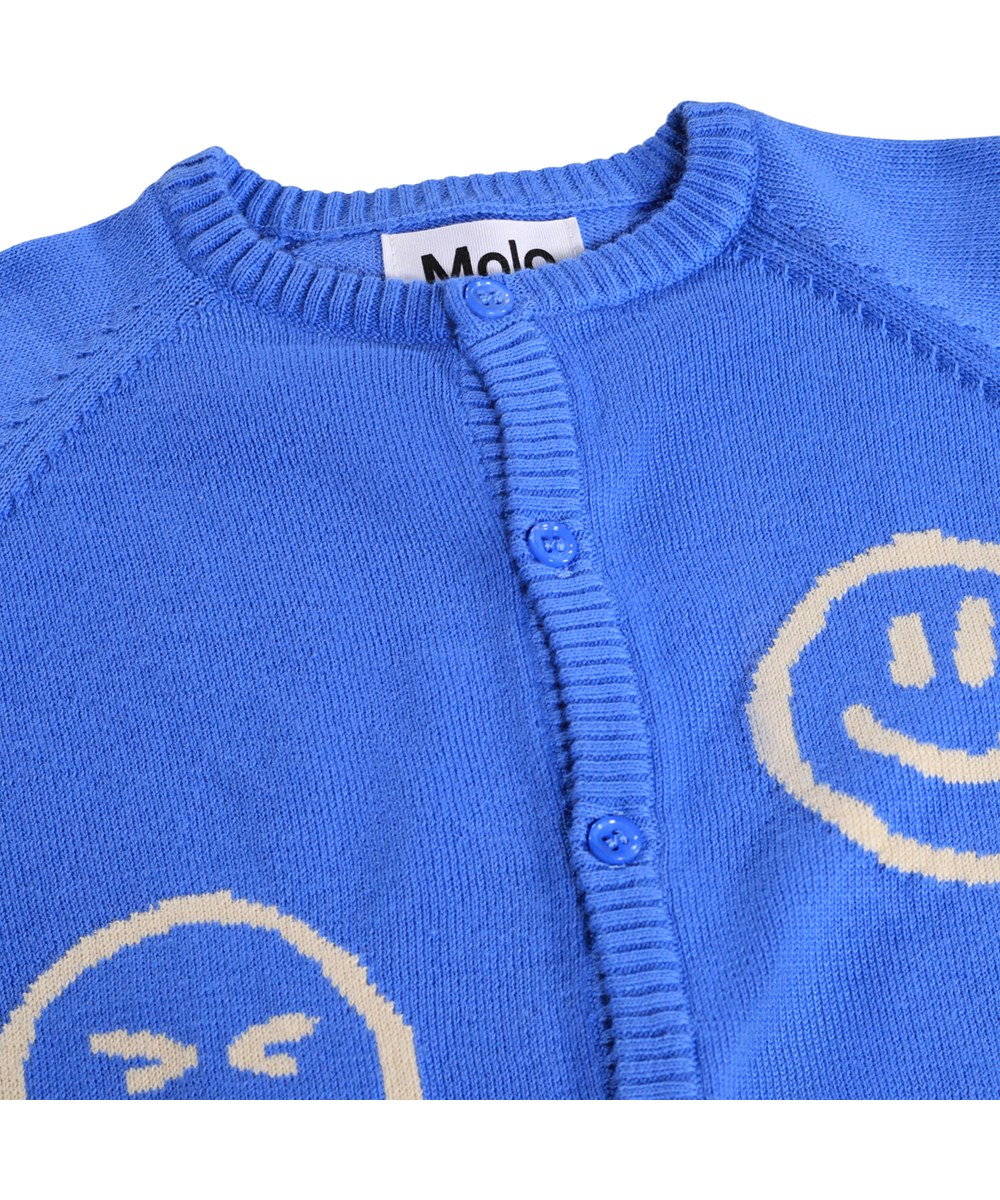 Brody - Blue Tide - Blauer Strick-Cardigan für die Kleinen aus weicher Bio-Baumwolle mit lustigen Figuren