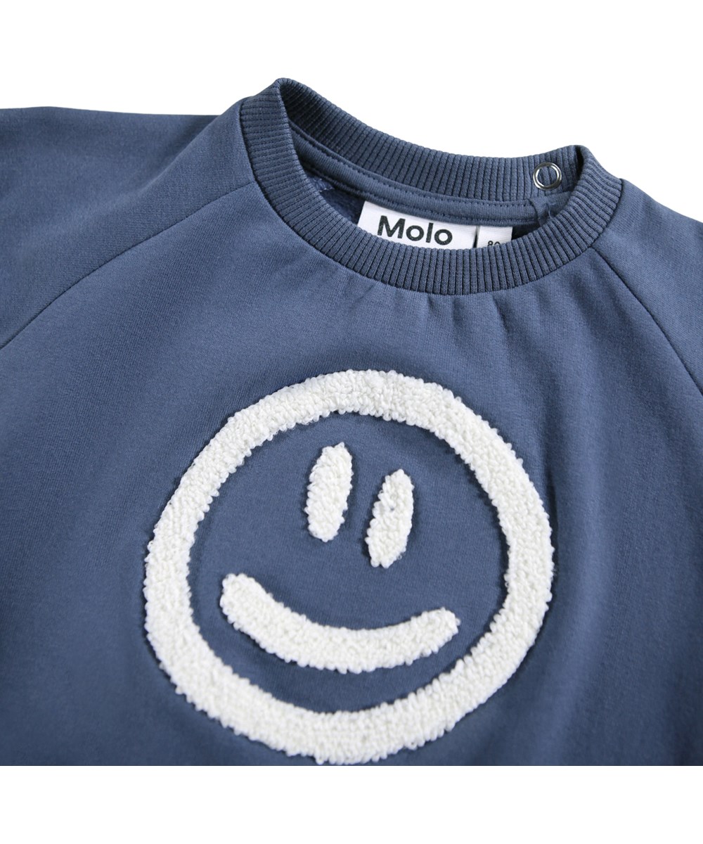 Disc - Evening Sky - Dunkelblaues Sweatshirt für die Kleinen aus weicher Öko-Baumwolle mit einem gestickten lächelnden Gesicht auf der Vorderseite.