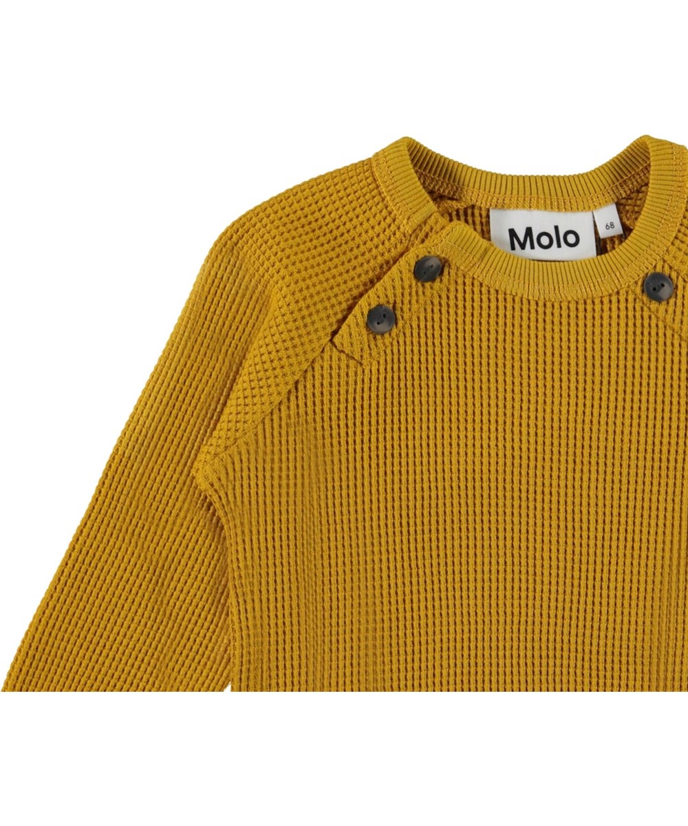 Dolly - Nugget Gold - Goldenes Sweatshirt aus waffeliger Öko-Baumwolle