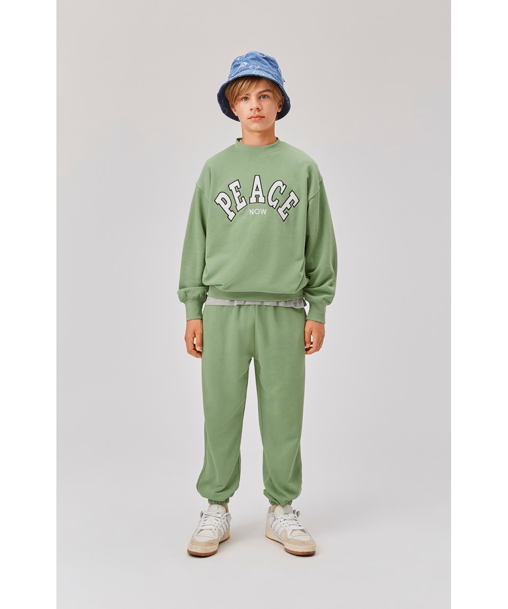 Mar - Meadow - Grünes Unisex-Peace Now-Sweatshirt