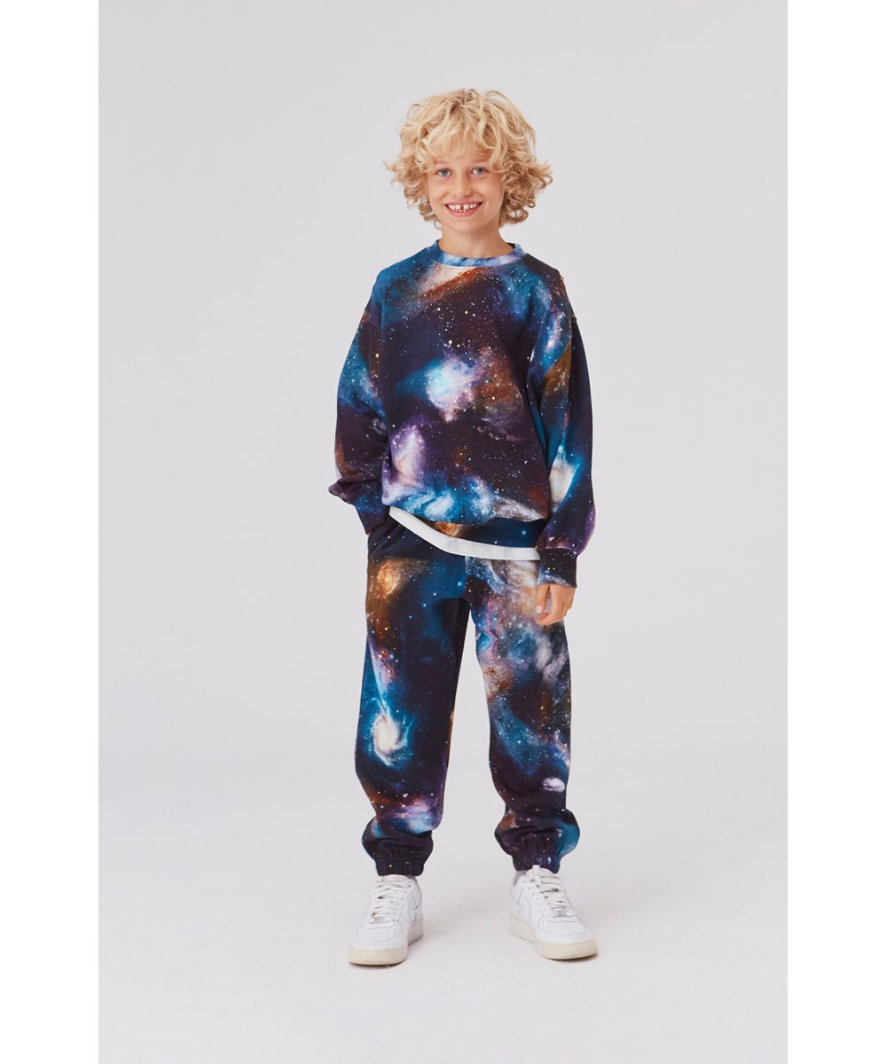 Monti - Galaxies - Öko-Unisex-Sweatshirt mit Galaxe-Print