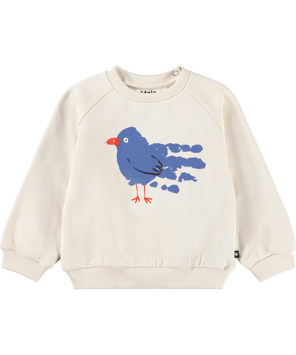 Disc - Blue Bird - Gebroken witte sweater voor de kleintjes gemaakt van zacht biologisch katoen met op de voorkant een print van een blauwe vogel.