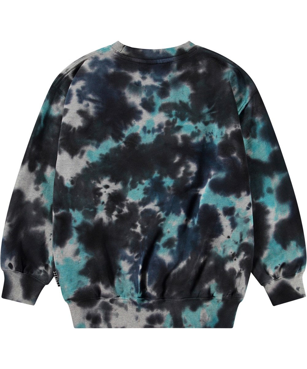 Monti - Blue Dark Dye - Blauwe tie-dye sweater gemaakt van biologisch katoen in een ruimvallende pasvorm.