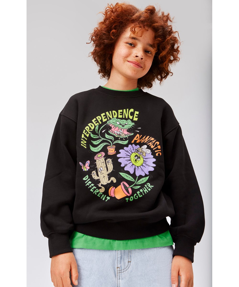 Monti - Plantastic Black - Zwarte trui met plantenprint