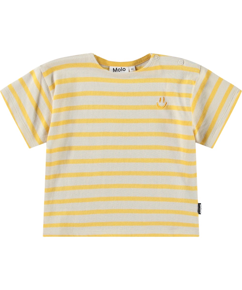 Eivor - Mimosa Stripe - Gestreiftes T-Shirt in Gelb und Beige mit kurzen Ärmeln aus Öko-Baumwolle für ein Baby.