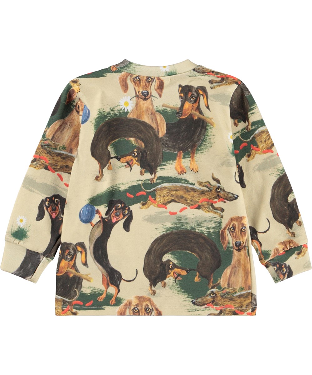 Eloy - Painted Dogs - Langärmeliges Oberteil für die Kleinen aus Öko-Baumwolljersey mit einem Druck von gezeichneten Dackeln.