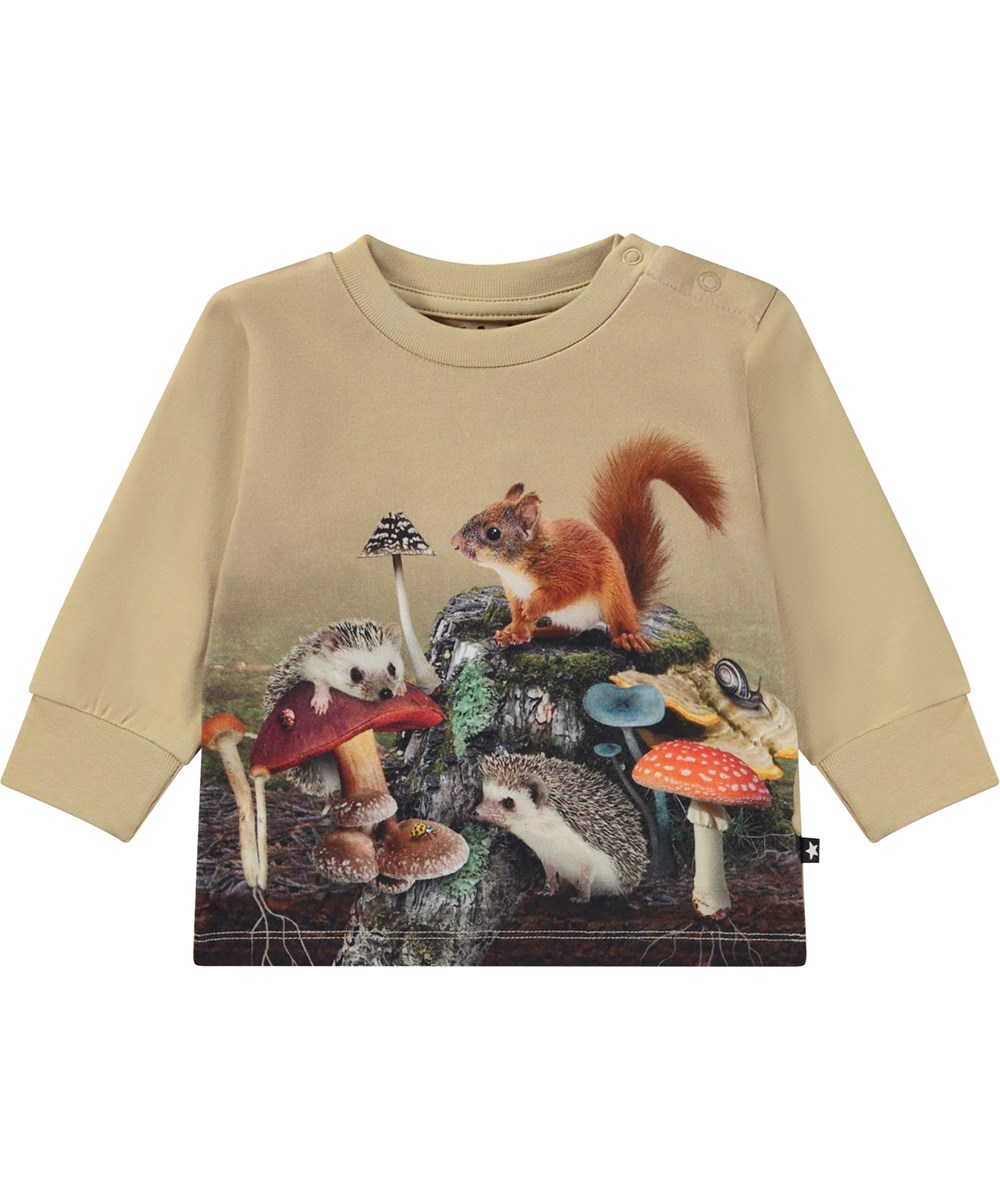 Eloy - Tree Stump - Beige økologisk baby bluse med skovbund placement print