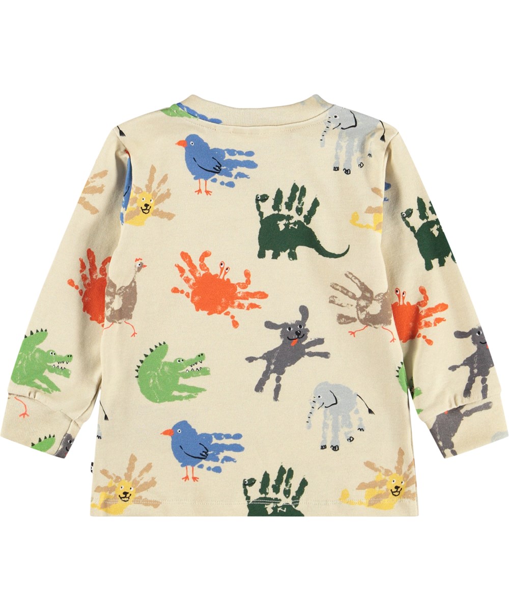 Eloy - Hand Animals - Beige long-sleeved top for the little ones made of organic cotton jersey with a colorful handprint of various animals.