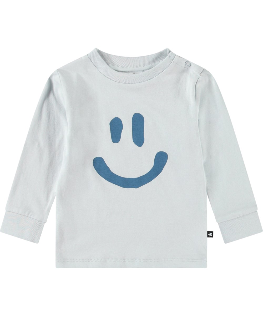 Eloy - Skywriting - Organic baby long-sleeved top with a print of a smiling face.