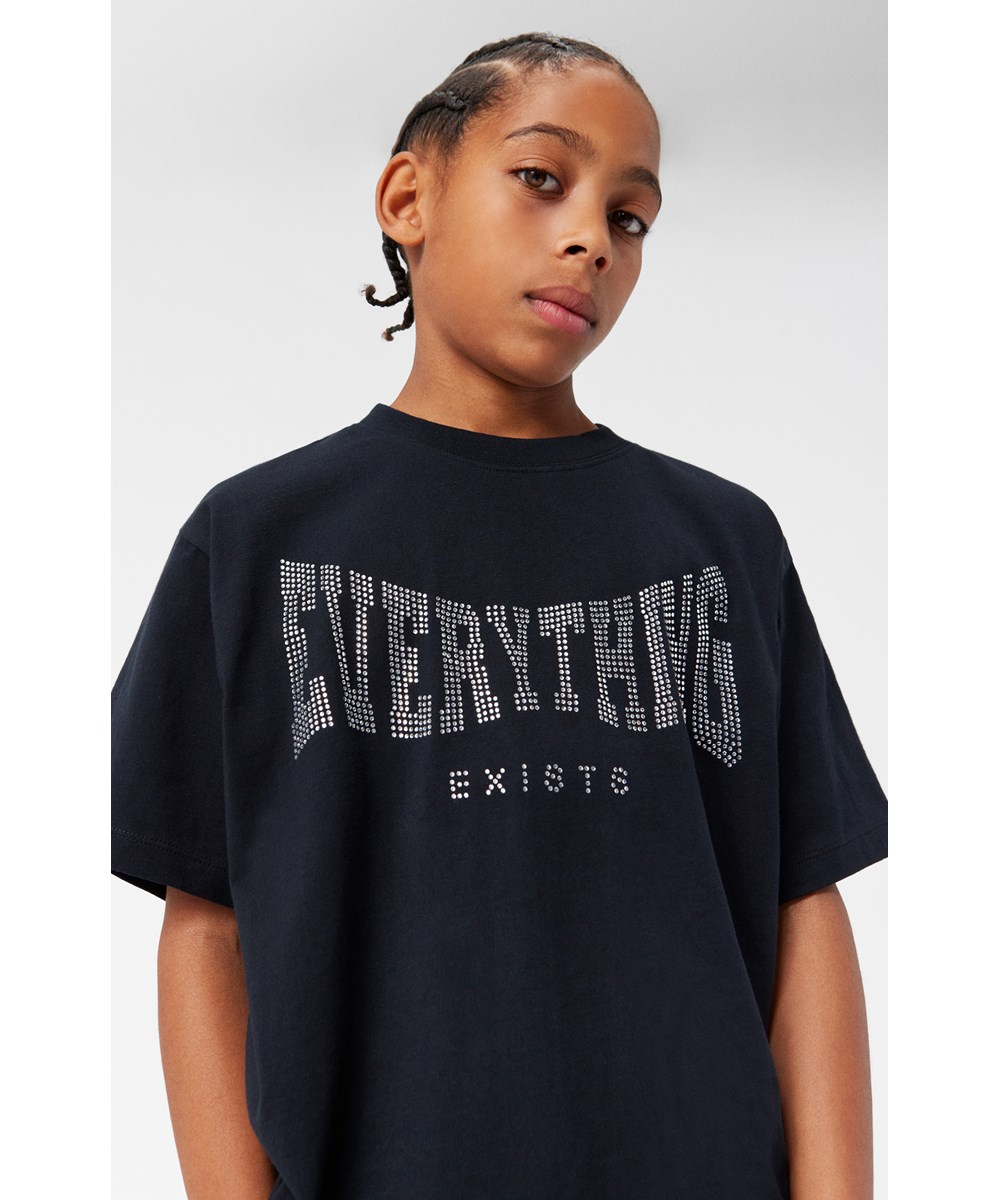 Rodney - Black - Black T-shirt with an "Everything Exists" rhinestone text print.
