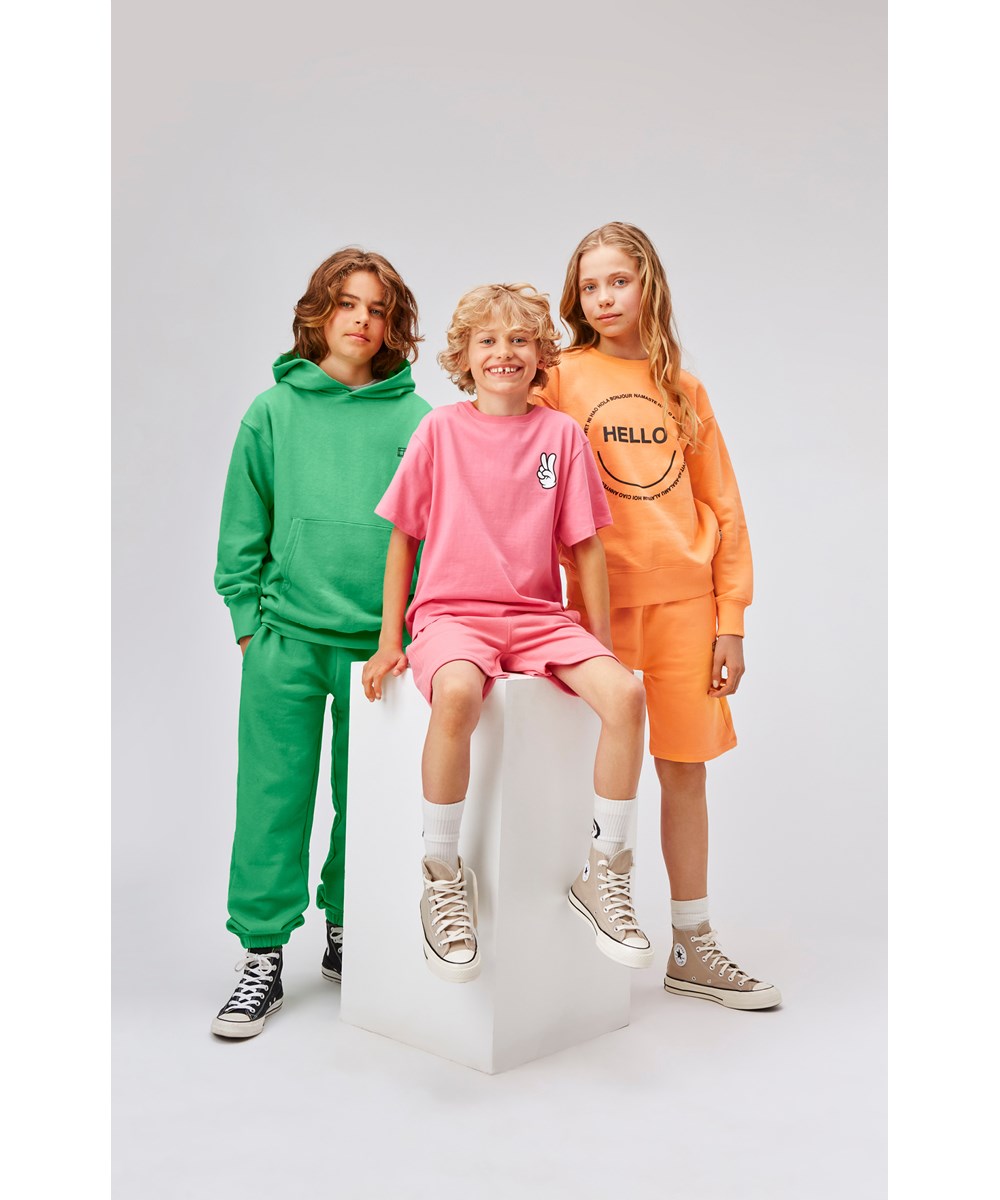 Rodney - Bubblegum - Pink unisex t-shirt with print of peace hand sign