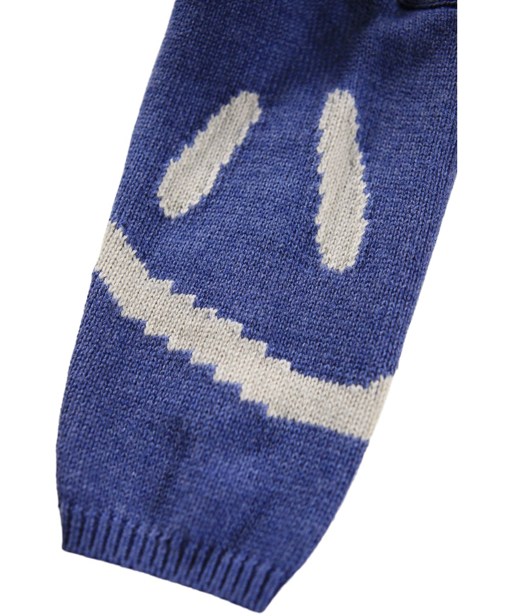 Brad - Evening Marl - Blå strik sweater til de mindste i en blød bomuld og uld blandning med hvide smilende ansigter.