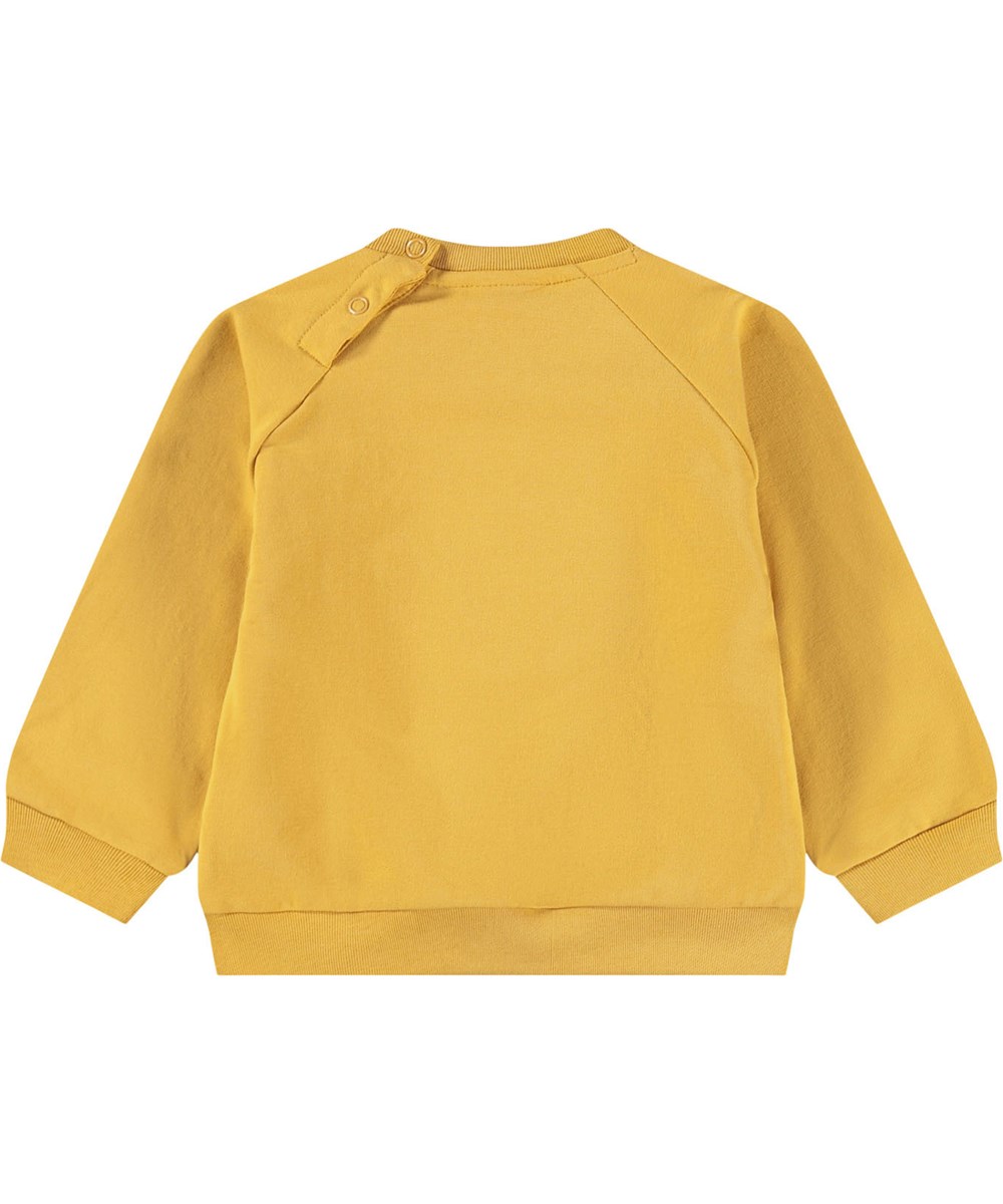 Disc - Energy - Gul sweatshirt til de mindste i blødt økologisk bomuld med et broderet smilende ansigt på fronten.