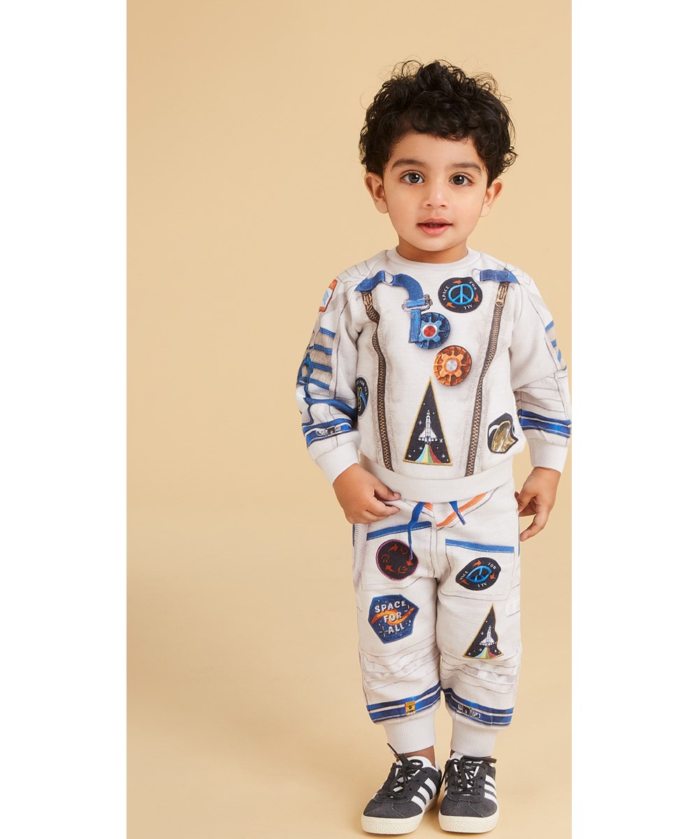 Disc - I Astronaut - Økologisk hvid babybluse med astronaut print
