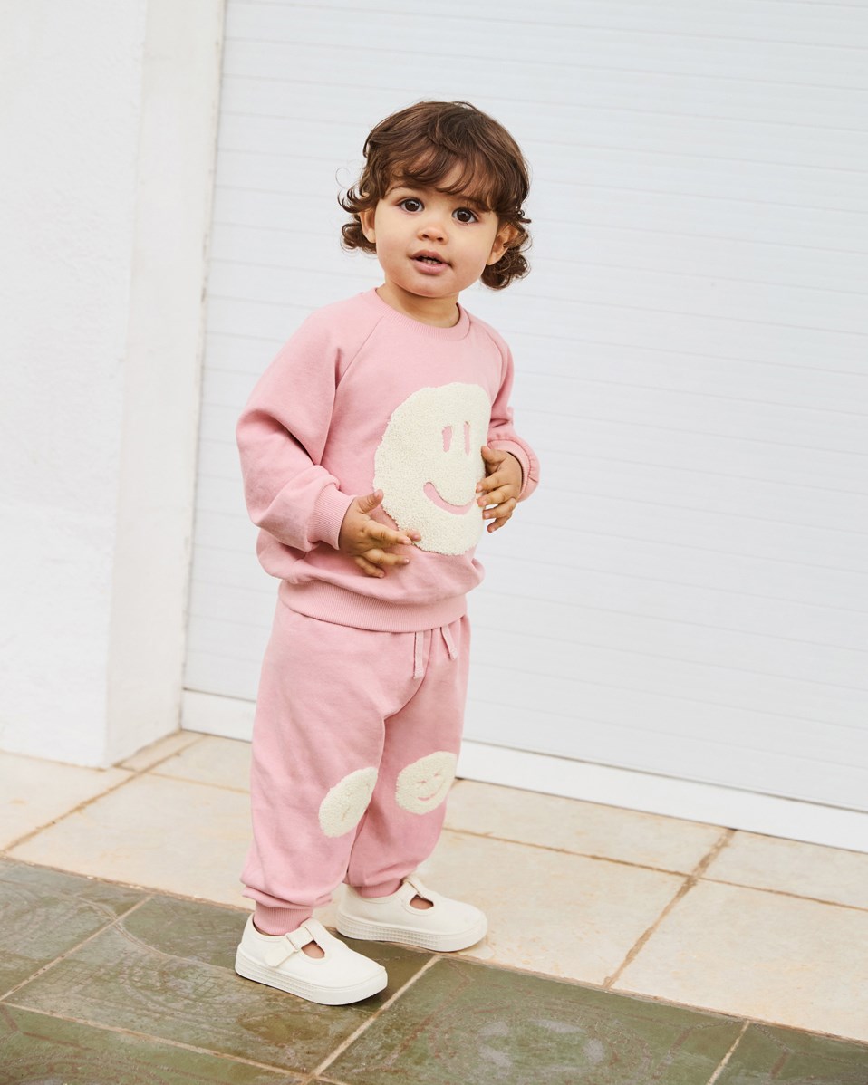 Disc - Rosequartz - Økologisk lyserød babysweatshirt med blødt smilende ansigt