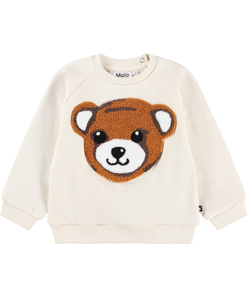 Disc - White Noise - Råhvid sweatshirt til de mindste i blødt økologisk bomuld med et broderet bamse ansigt på fronten.