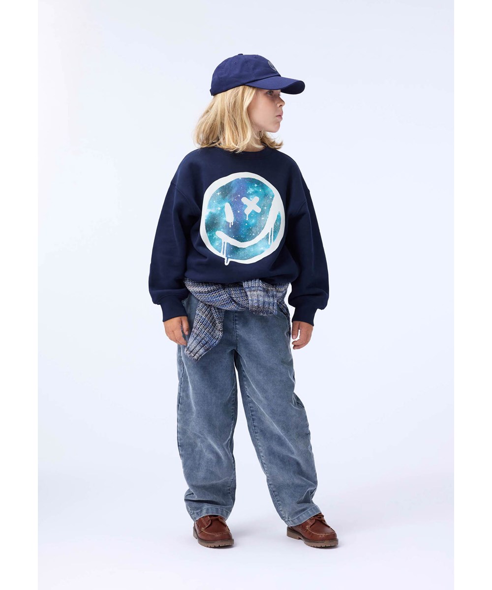 Mar - Drippy Galaxy - Mørkeblå sweatshirt til børn i blødt økologisk bomuld med et stort print af et smilende. 