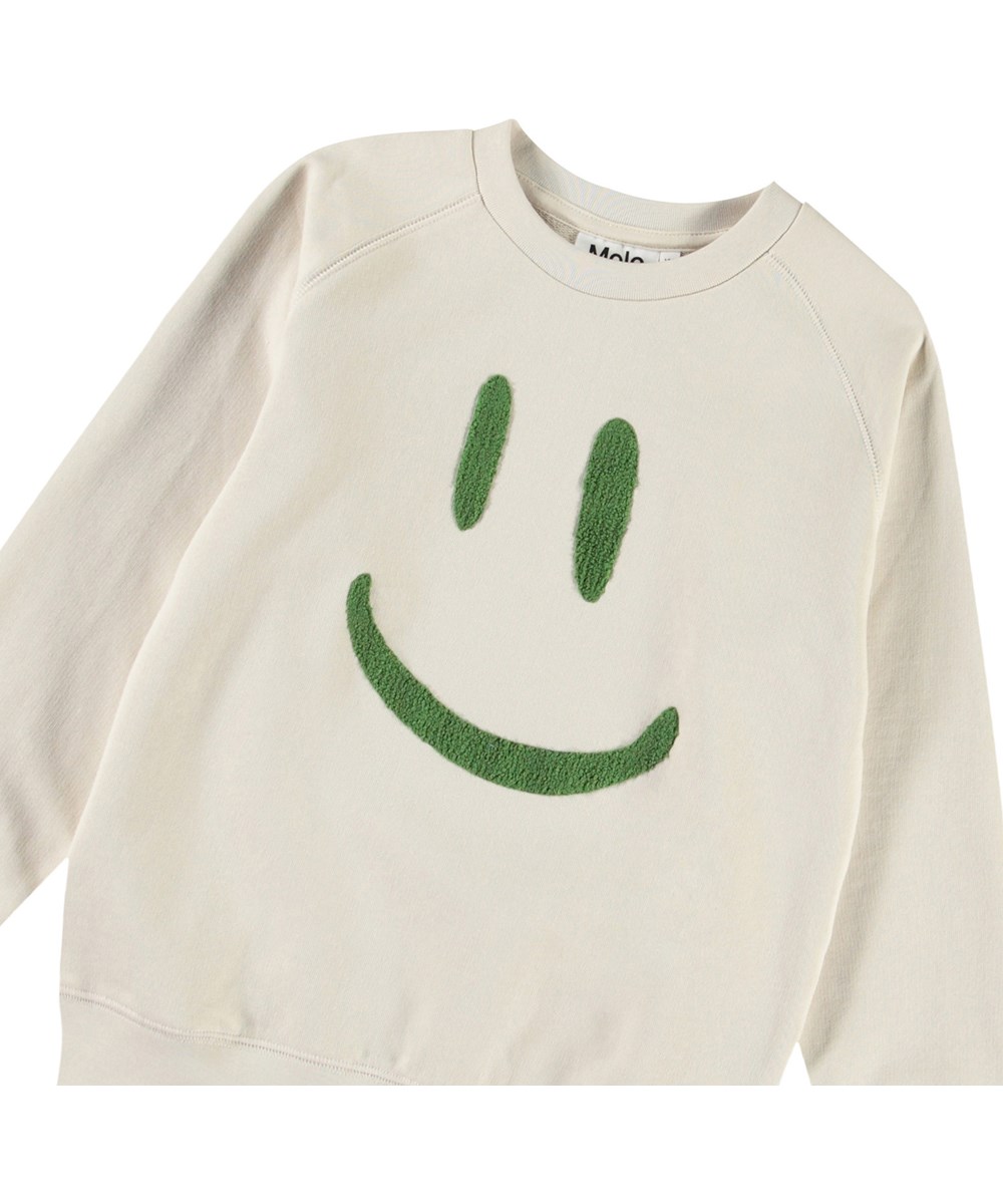 Mike - White Noise - Råhvid sweatshirt til børn i blødt økologisk bomuld med raglandsærmer, ribkanter ved hals, ærmer og i bunden af blusen.