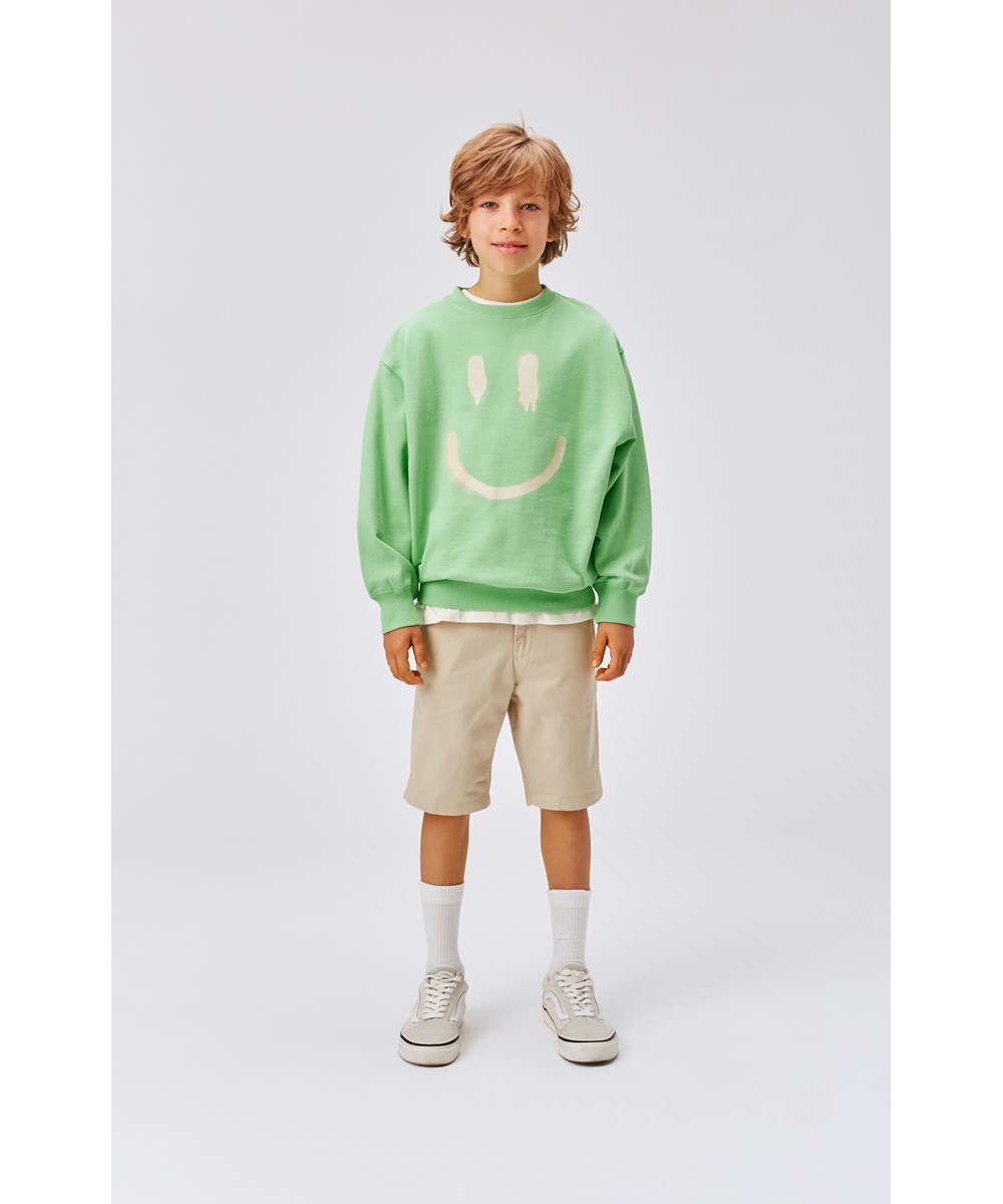 Monti - Crisp Green - Unisex grøn sweatshirt med smiley