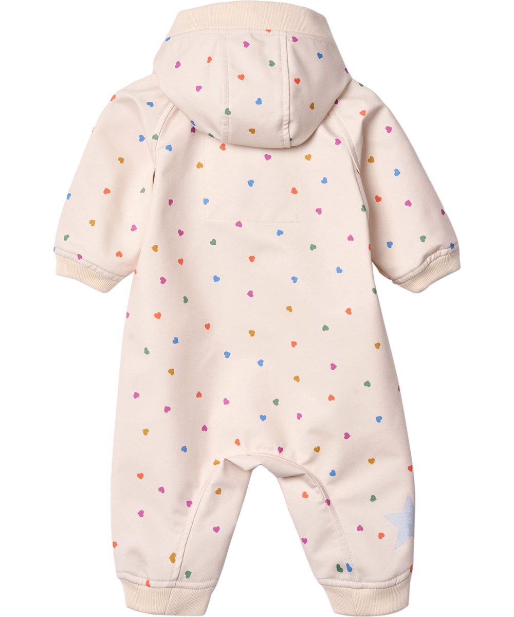 Hill - Confetti_Rainbow - Beige wind- en waterafstotend softshellpak voor de kleintjes met fleecevoering en hartjesprint.