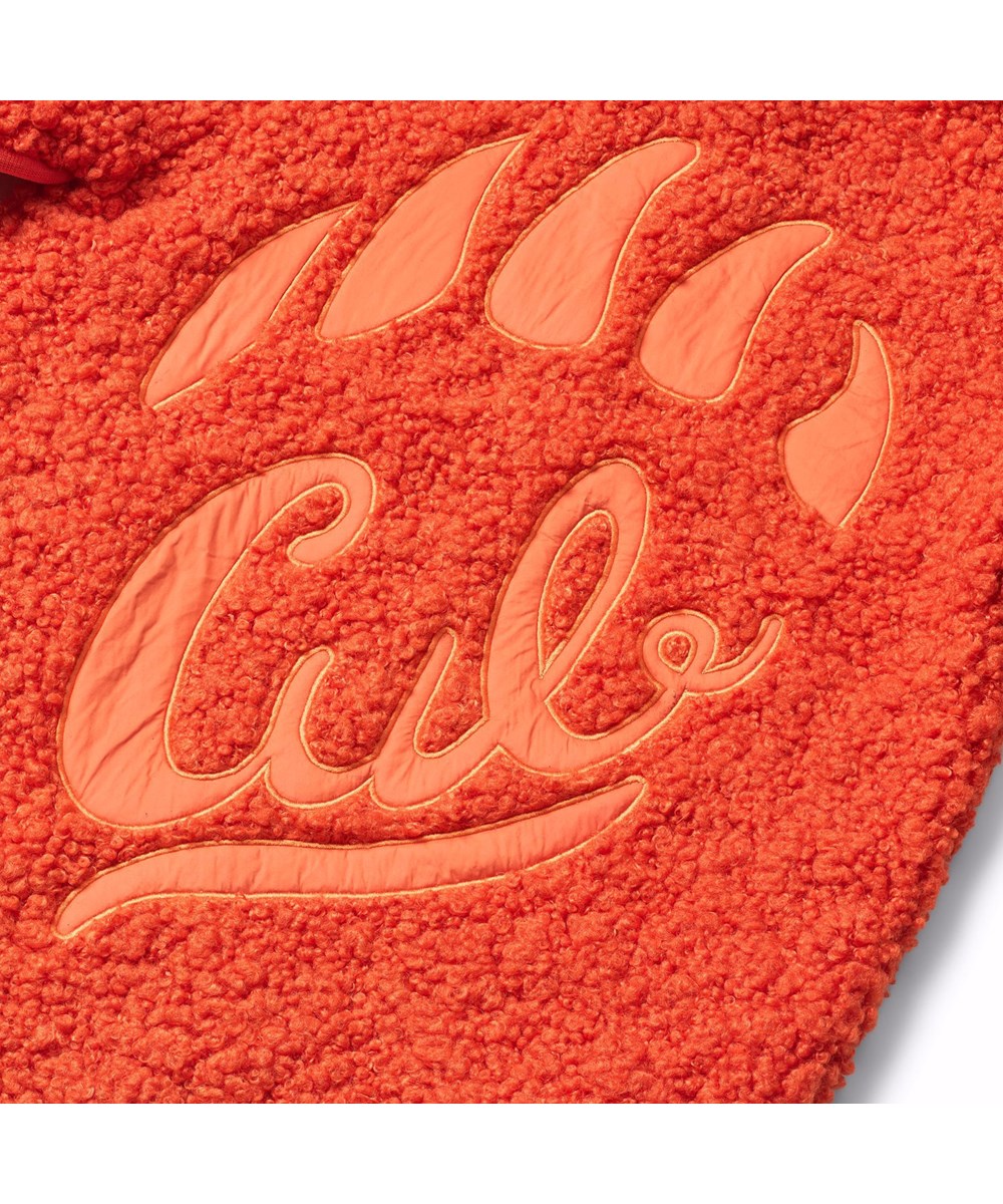 Ulan - Rising Sun - Oranje fleecejas voor kinderen gemaakt van gerecycled polyester met op de achterkant een leuke patch in duurzaam nylon.