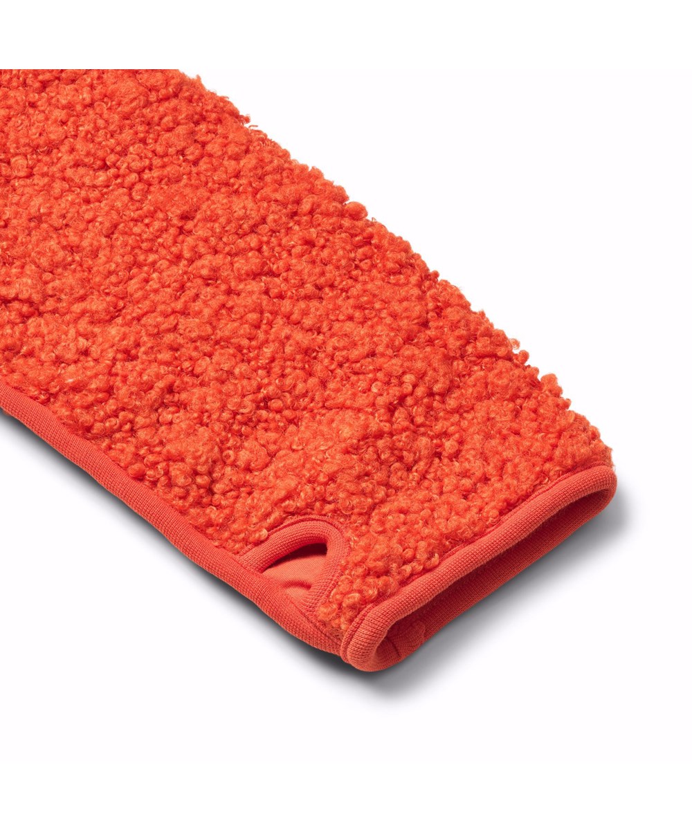 Ulan - Rising Sun - Oranje fleecejas voor kinderen gemaakt van gerecycled polyester met op de achterkant een leuke patch in duurzaam nylon.