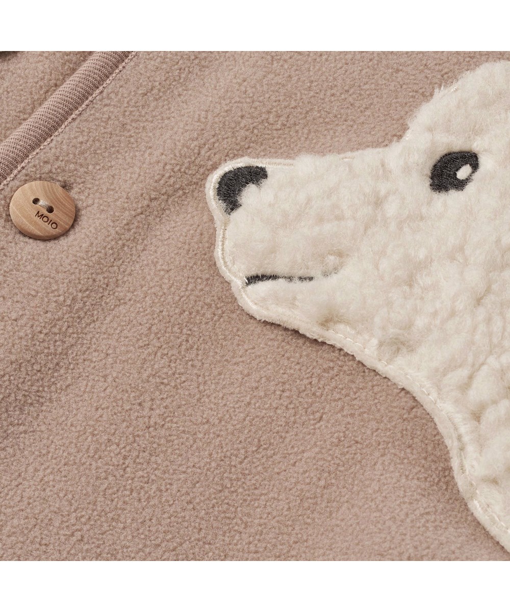 Uli - Mocha - Beige en gebroken witte fleece jas voor baby's en peuters.