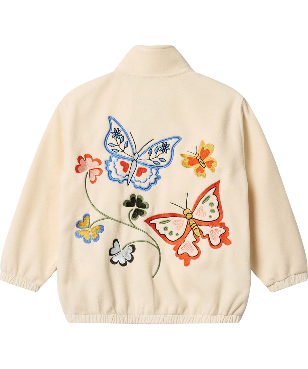 Utta - Pearled Ivory - Off-white fleecejack voor kinderen gemaakt van gerecycled polyester met bloemenborduursel.