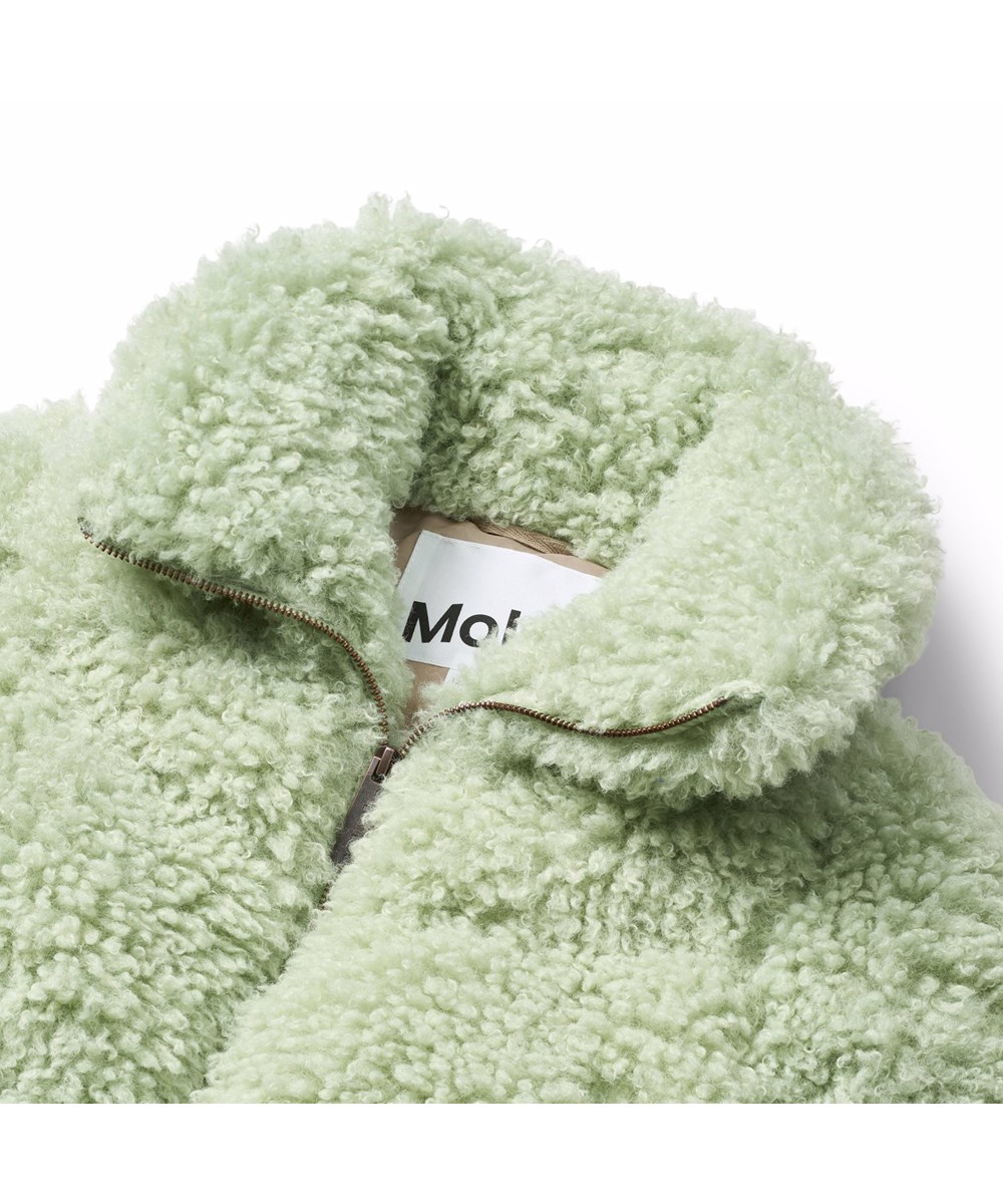 Havi - Menthe - Groene imitiatiebontjas voor kinderen met een schapenvacht-look gemaakt van gerecycled polyester.