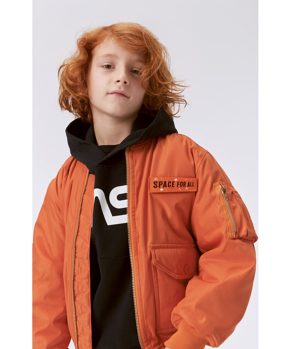 Heath - Sun Power - Oranje bomberjack met Space for All