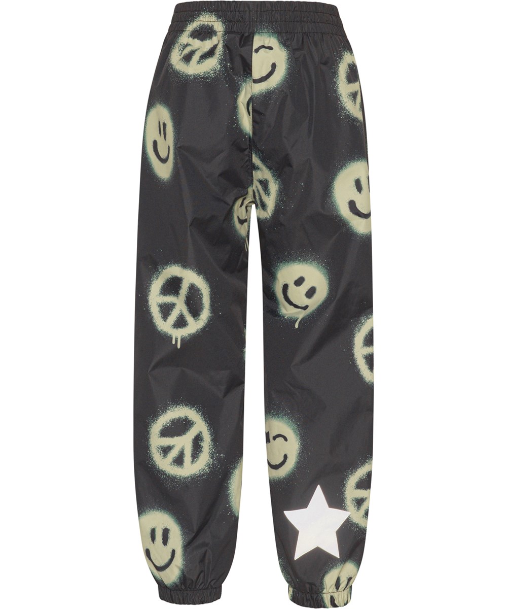 Waits - Happy Peace - Zwarte regenbroek met gele smiley’s