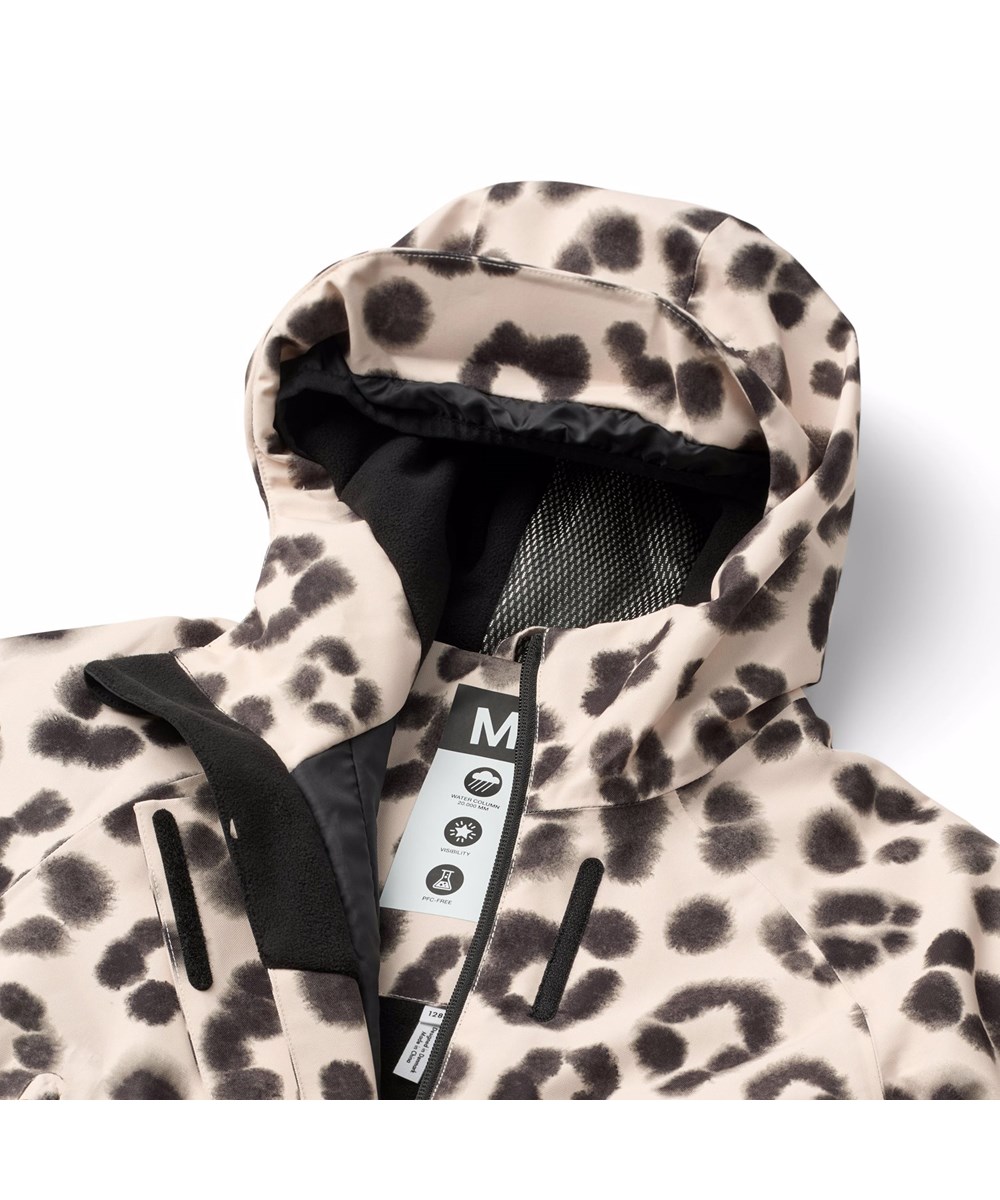 Hux - Snow Leo - Wind- en waterdicht skipak voor een kouden winter of skivakantie in een unieke luipaardprint gemaakt van gerecycled polyester en gevoerd met 3M™ Thinsulate™.