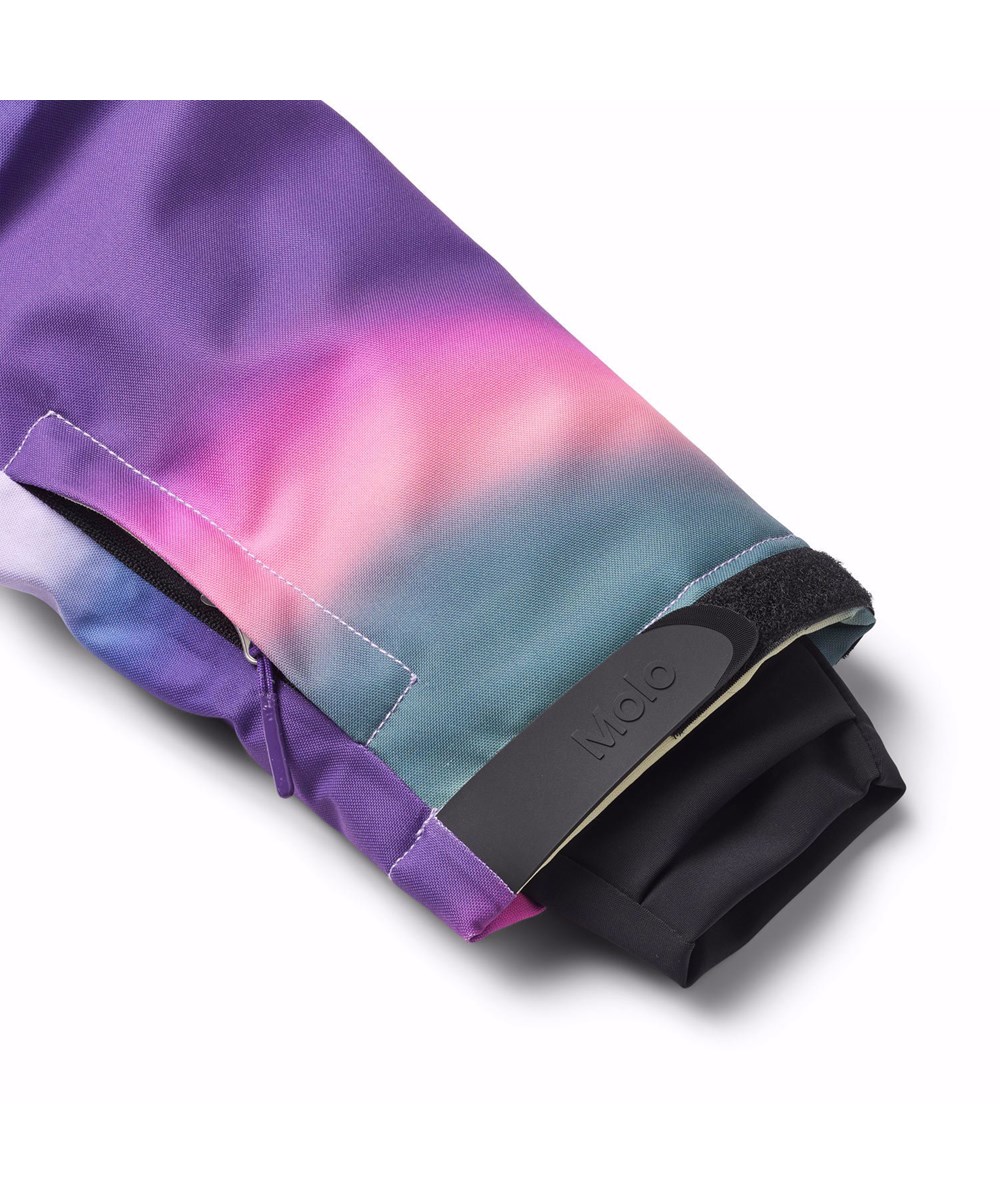 Hux - Wavy Rainbow - Kinder skipak gemaakt van gerecycled polyester met een kleurrijke overlopende graffiti print.