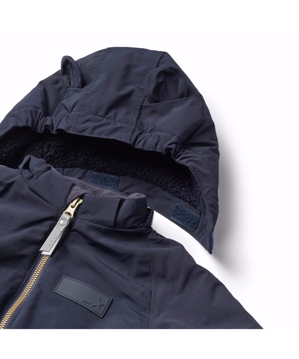 Hyde - Dark Night - Praktische winterlaarzen voor kinderen met een stevige en antislip zwarte zool en een print van paarden op een dromerige achtergrond in tinten roze en paars.