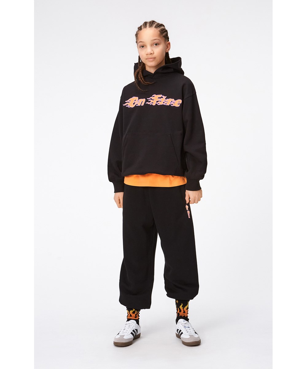 Adan - Black - Black jogging trousers with on fire print