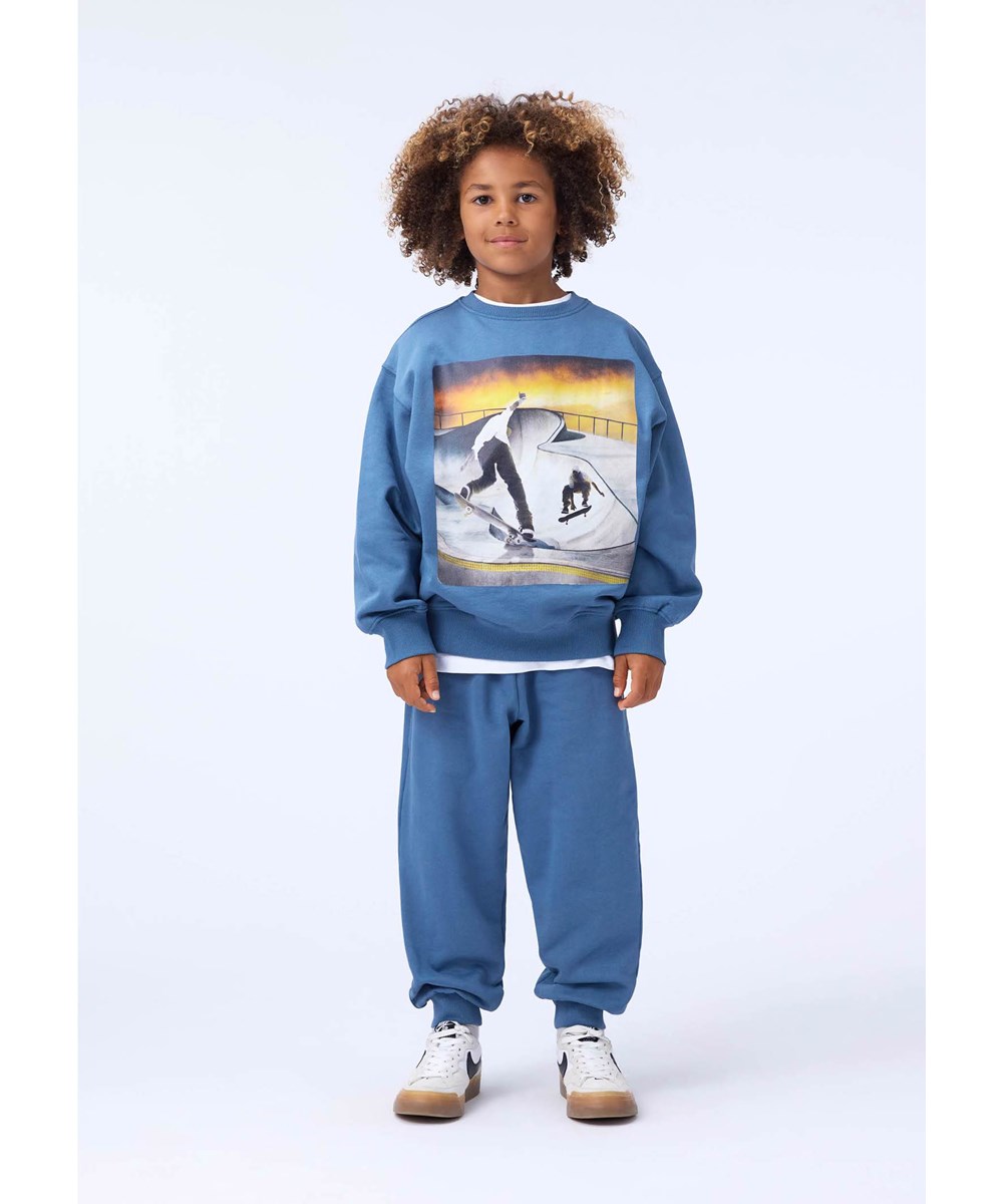 Adani - Blue Dust - Blue sweatpants for children made of organic cotton.