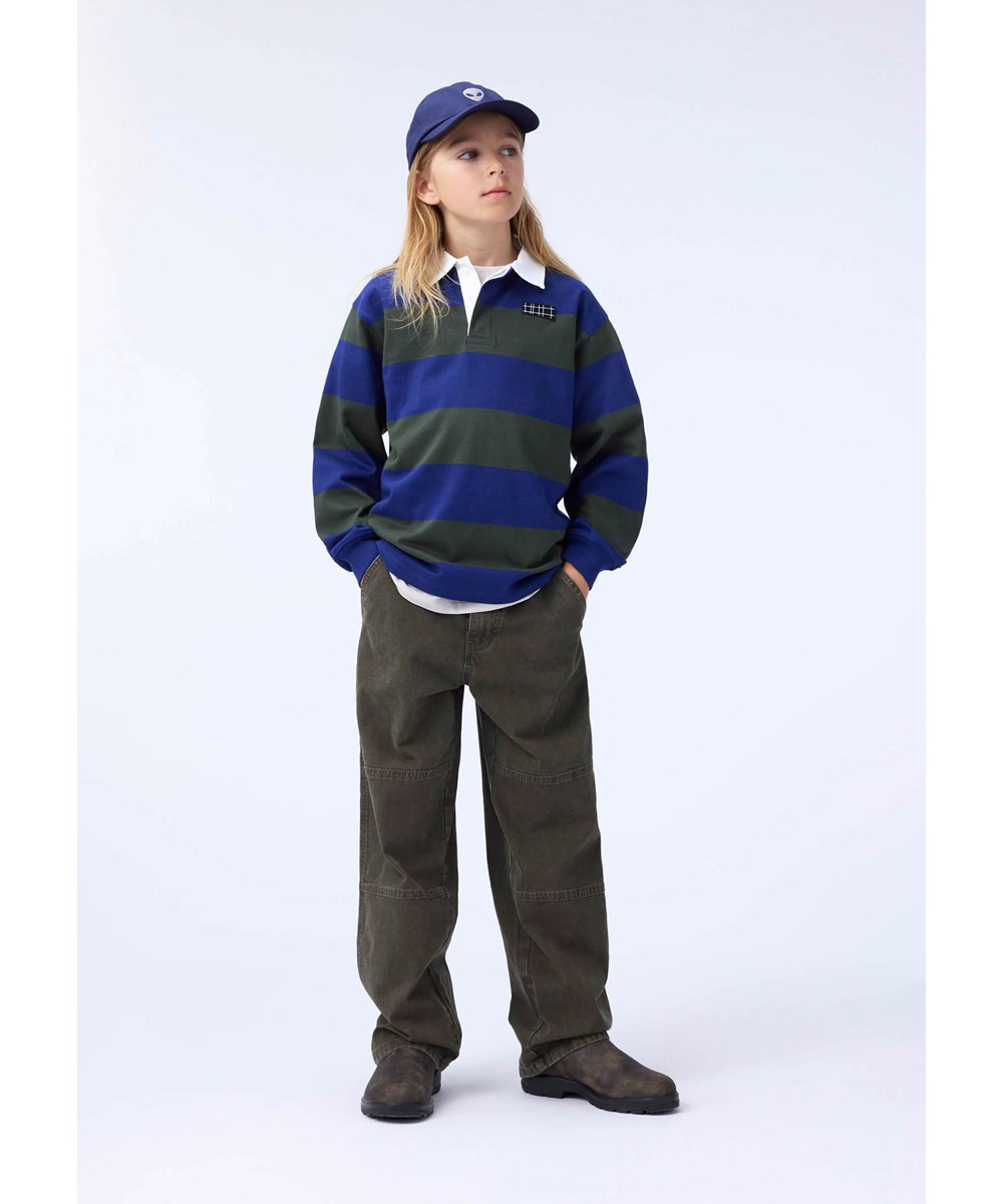 Alfred - Vegetation Wash - Green wide canvas pants for children made of cotton with stitching.
