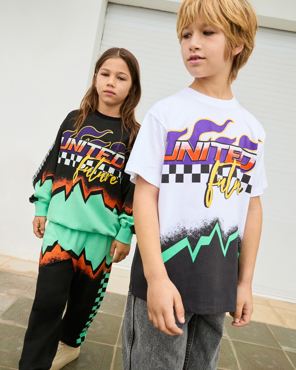 Allen - Future United - Sweatpants in organic cotton with motocross references for children.