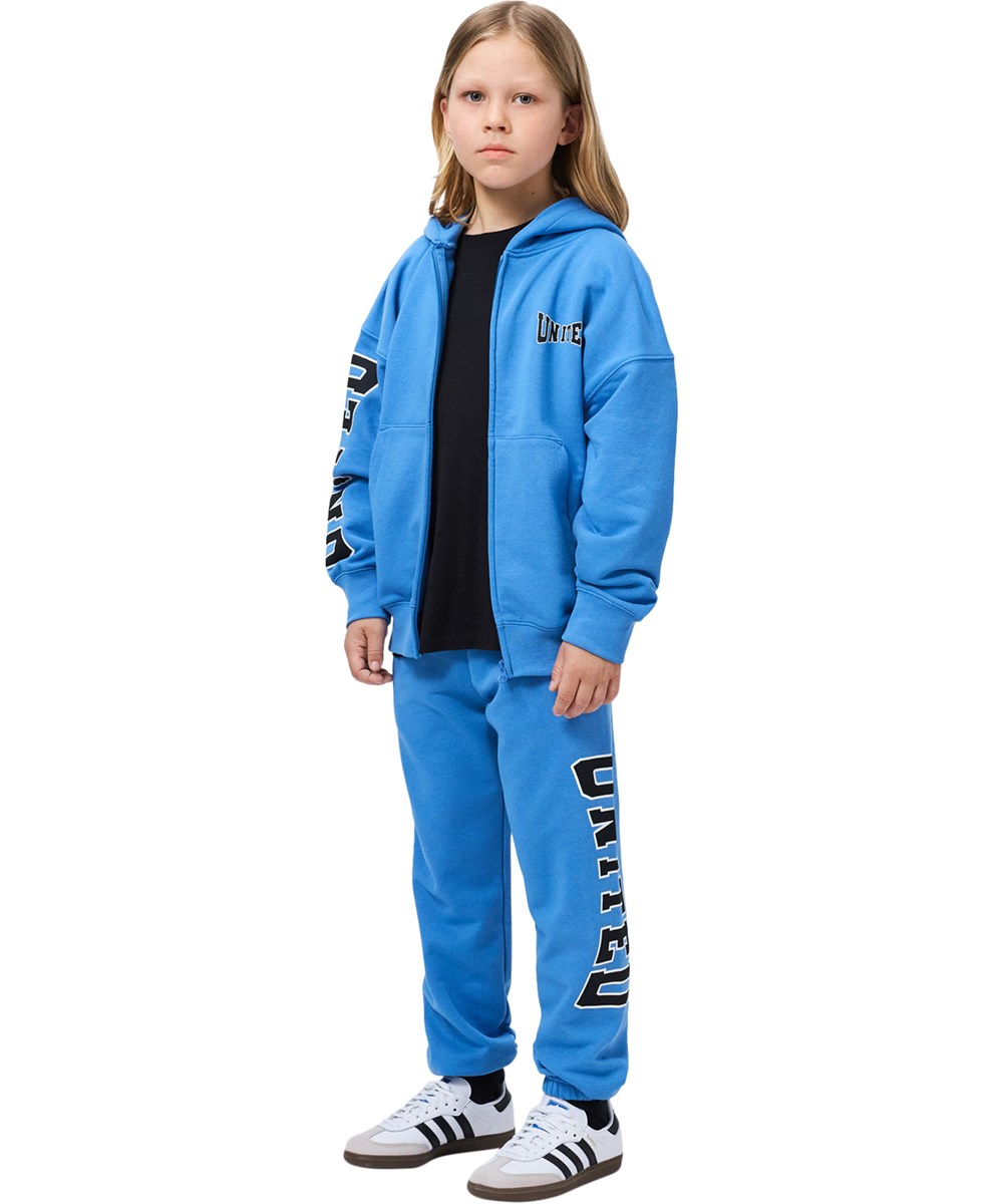 Allen - Blue Tide - Blue sweatpants for children made of soft cotton with a print