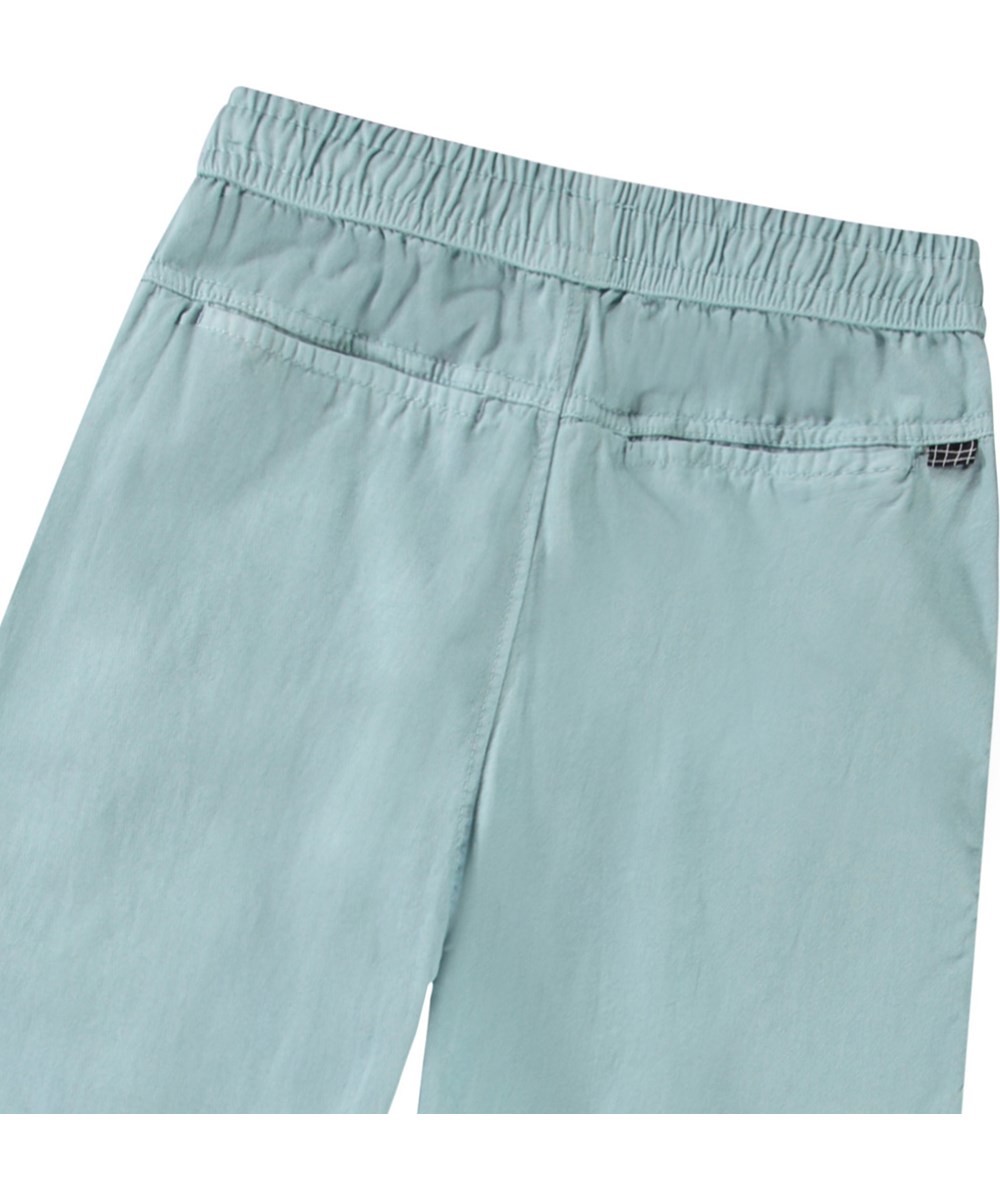 Aster - Misty Blue - Dusty blue pants, made in organic cotton for children.