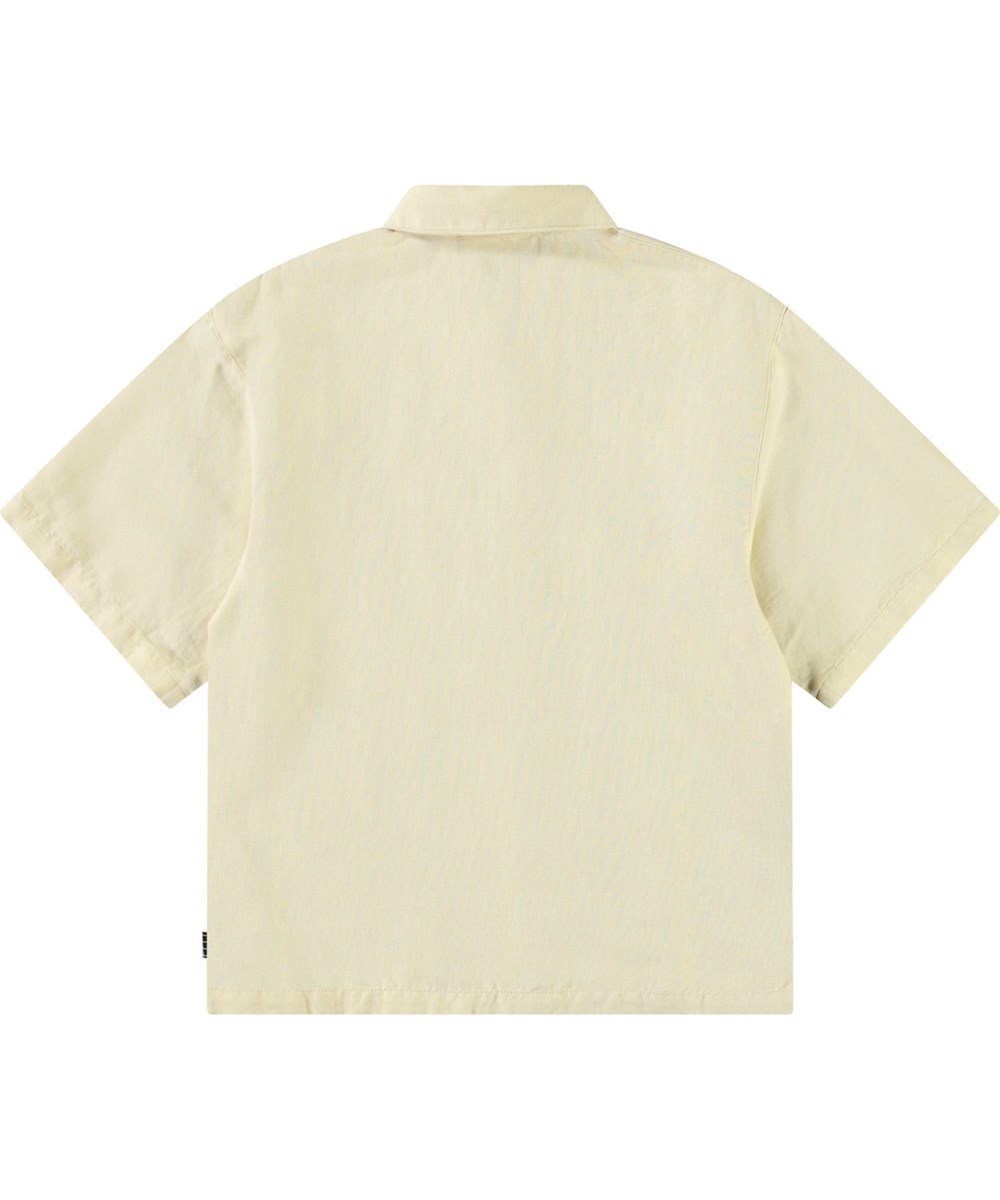 Richie - Alabaster - Oversized beige linen shirt with wide t-shirt sleeves, classic shirt collar, and button fastening at the front.